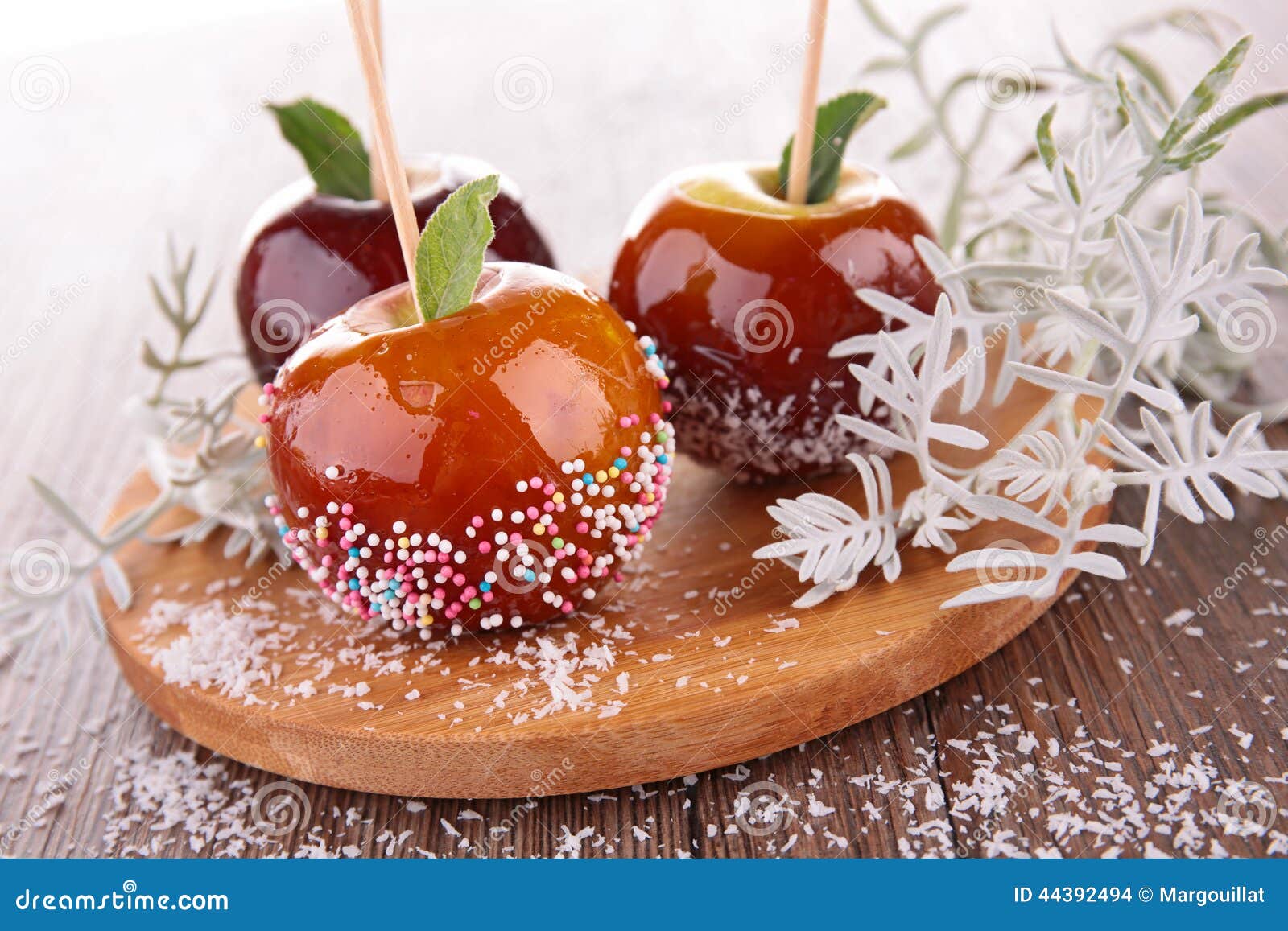 Caramel apple on stick stock photo. Image of buffet, glazed 44392494