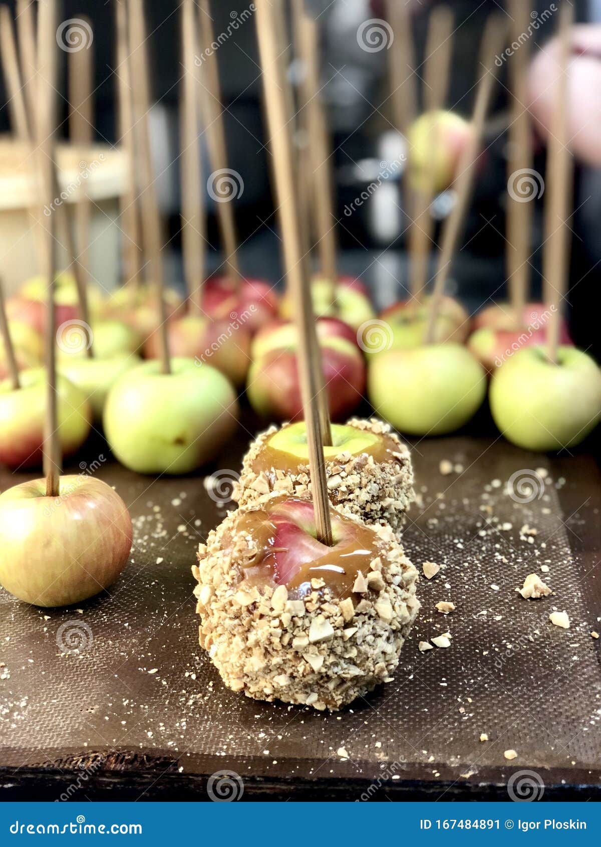 Caramel apples with sticks stock image. Image of fall 167484891