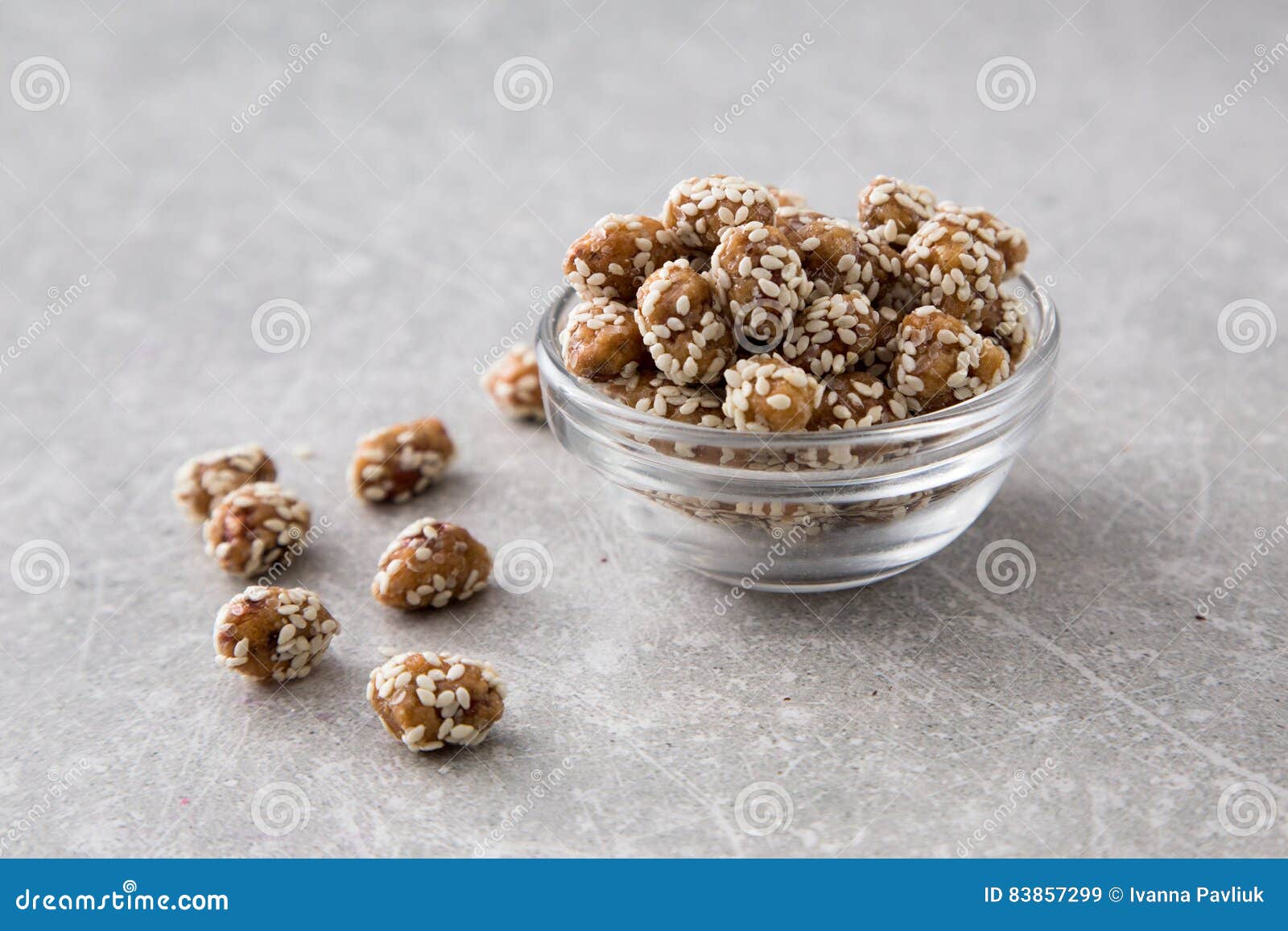 Caramel Coated Peanut with Sesame on Stone Background Stock Image