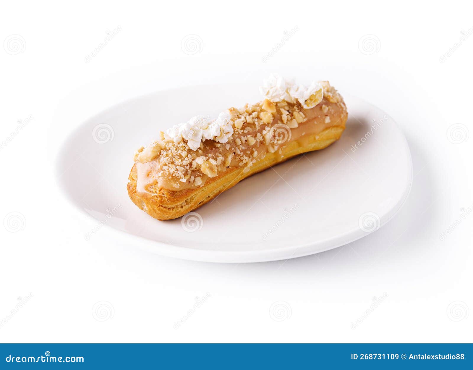 Caramel Eclair on White Plate Stock Image Image of pastry, cake