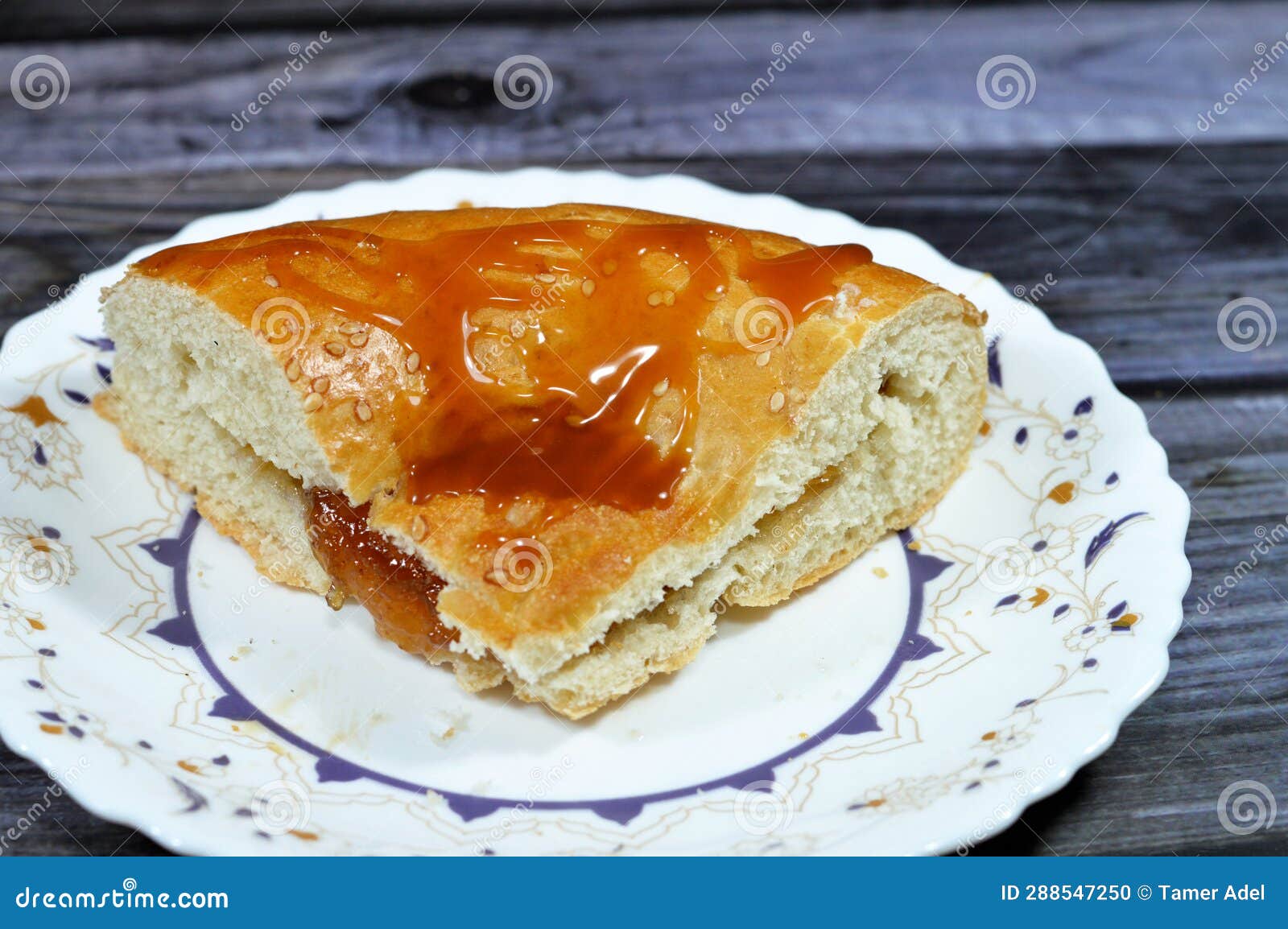 caramel sauce and fig jam with a tandyr nan uzbek bread, a type of central asian bread, often decorated by stamping patterns on