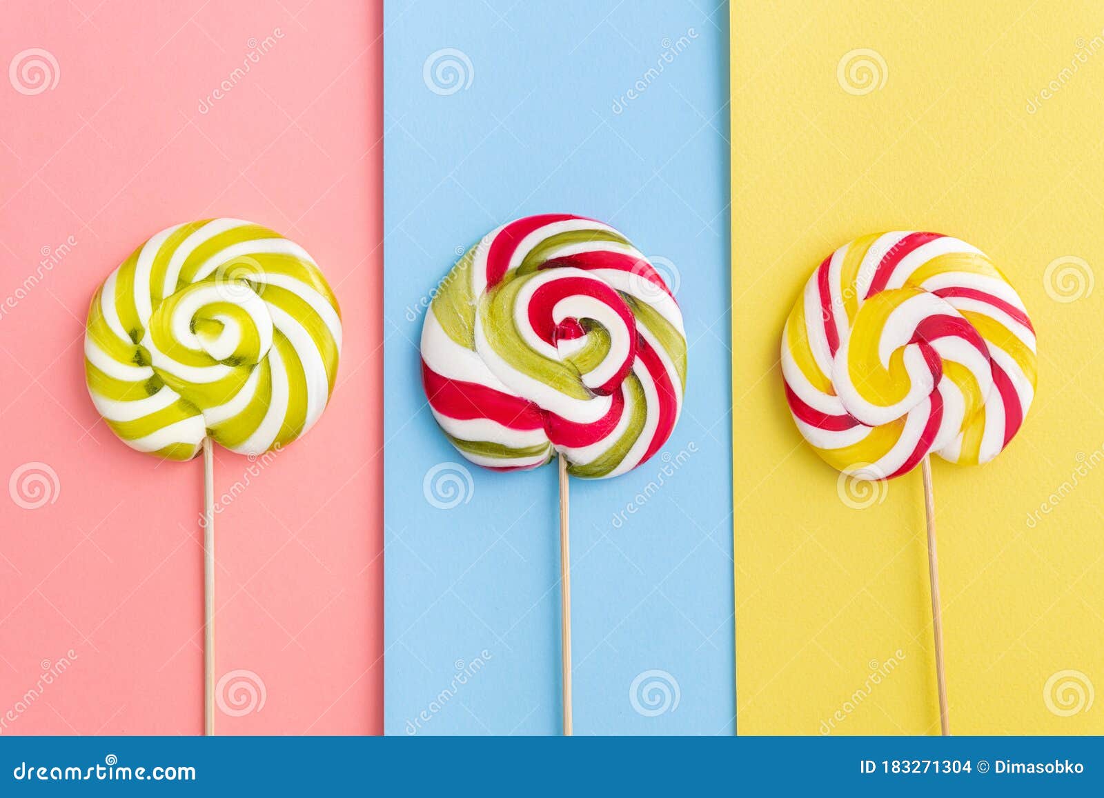 Caramelos De Lollypops En Colores Pastel De Moda Foto de archivo - Imagen  de bocado, grande: 183271304