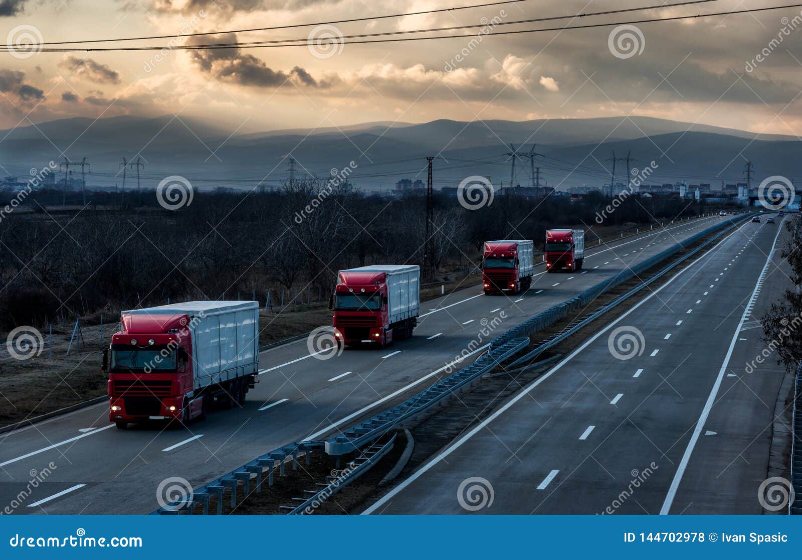 Caravan or Convoy of Lorry Trucks on Country Highway Stock Photo ...
