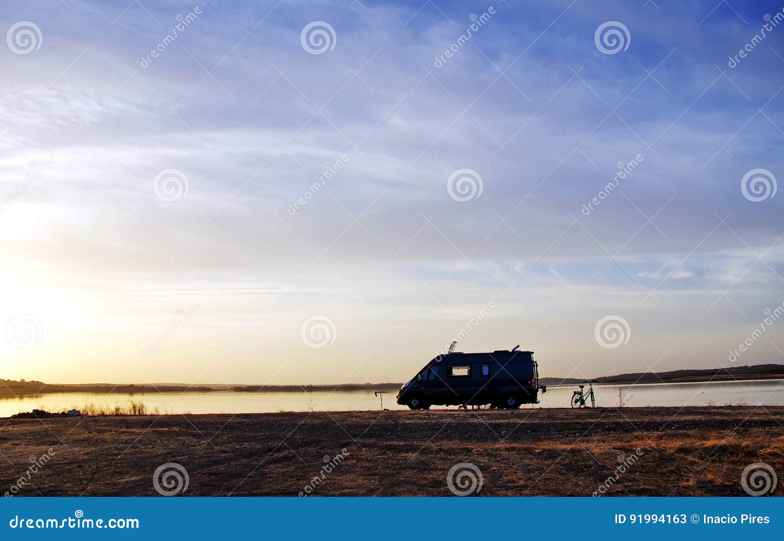 caravan silhouette in alqueva lake