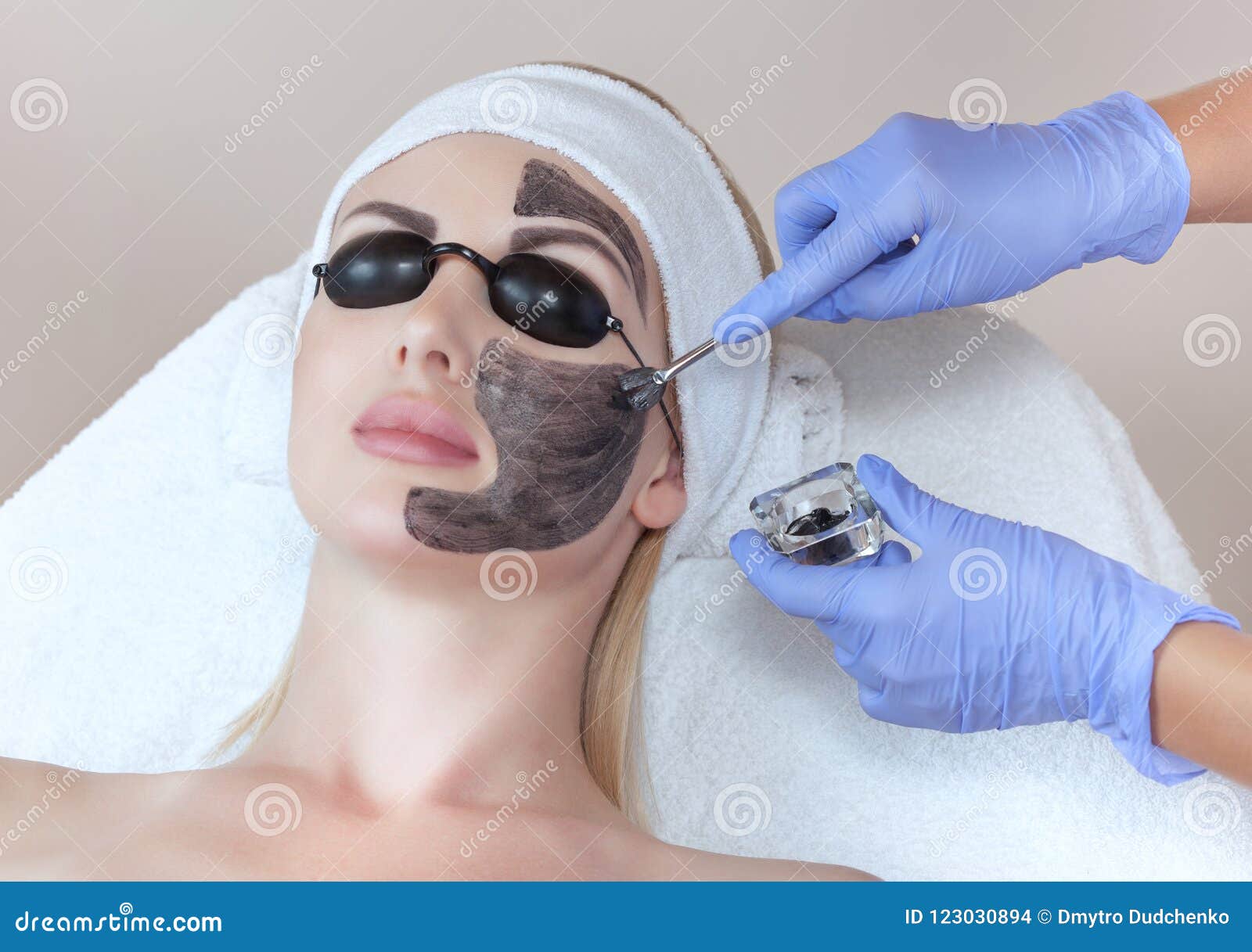 carbon face peeling procedure in a beauty salon. hardware cosmetology