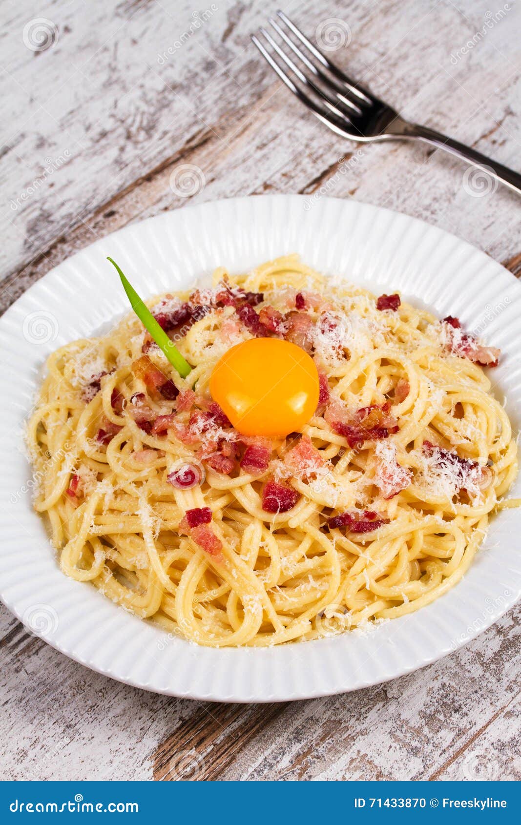 Carbonara Pasta with Raw Egg, Bacon and Parmesan Cheese Stock Photo