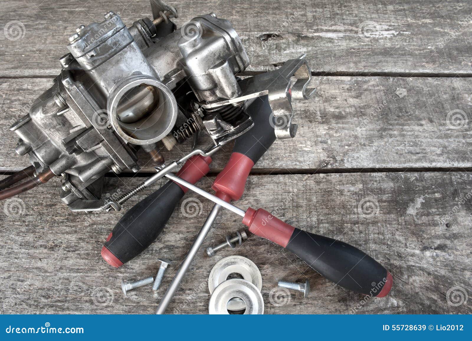 carburetor and screwdrivers