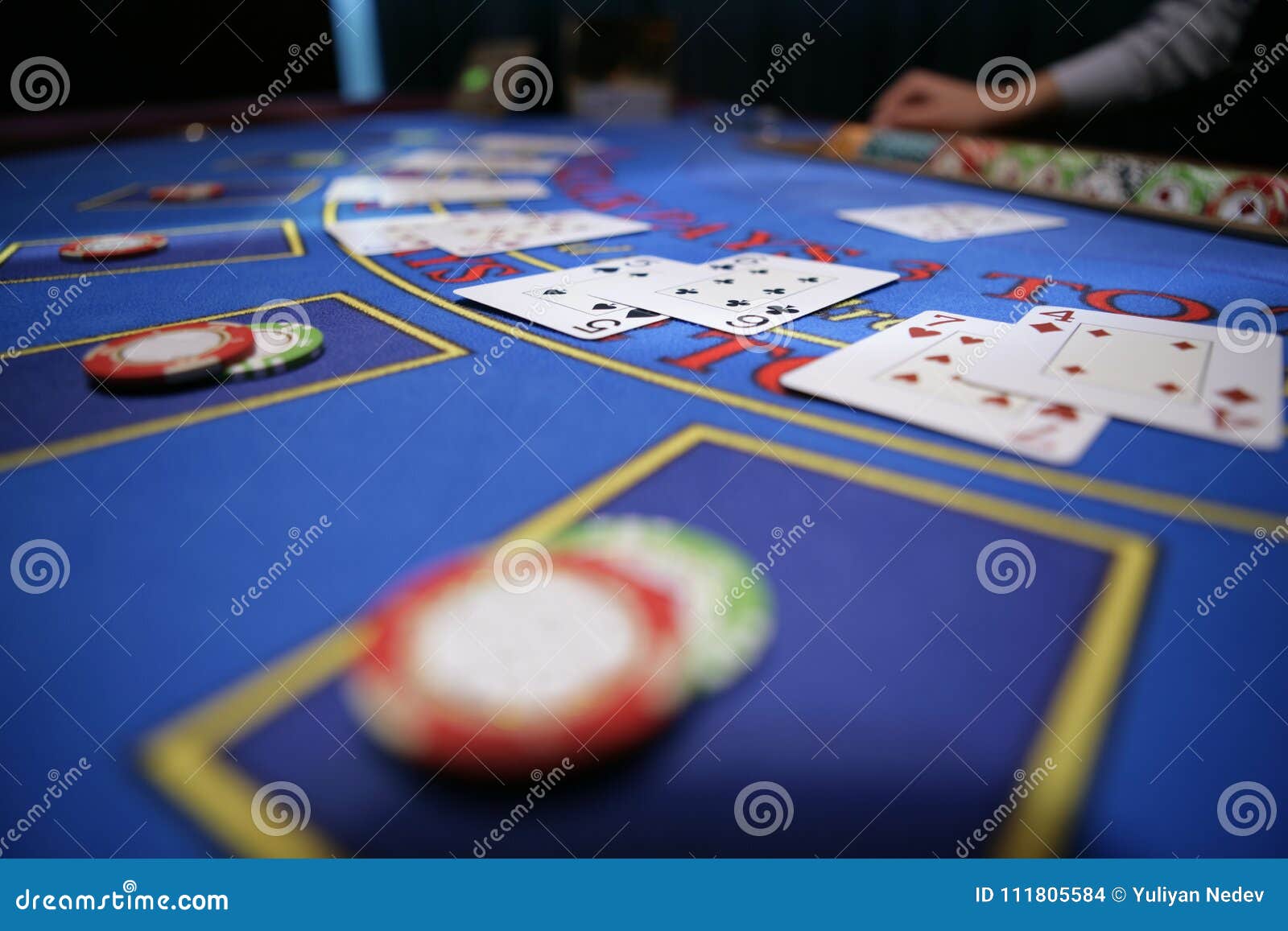 Card player checks hand stock photo. Image of game, contemporary