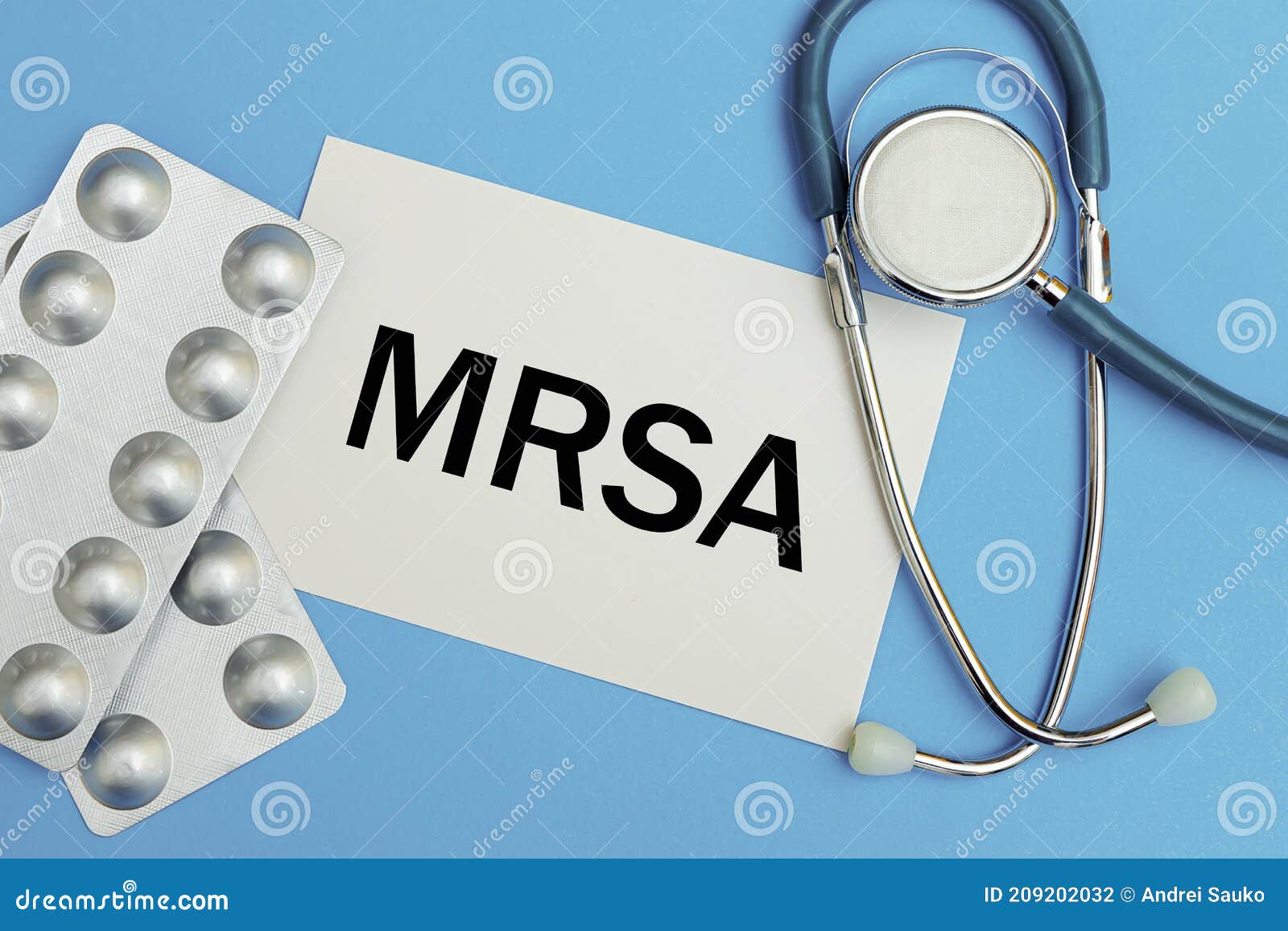 card with text mrsa methicillin-resistant staphylococcus aureus  pills and stethoscope