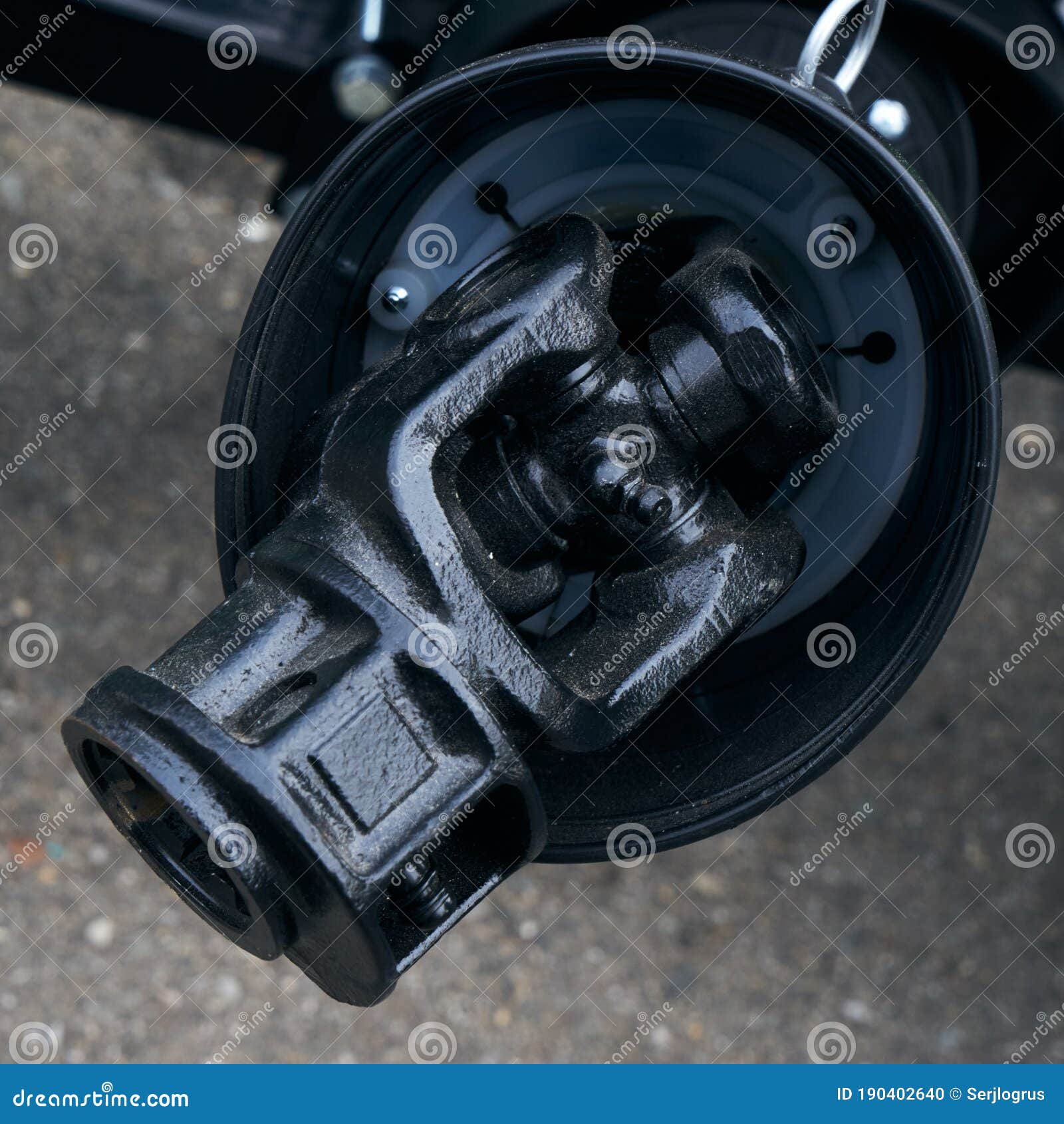 Driveshaft With Cardan Joint From A Car On White Isolated Background