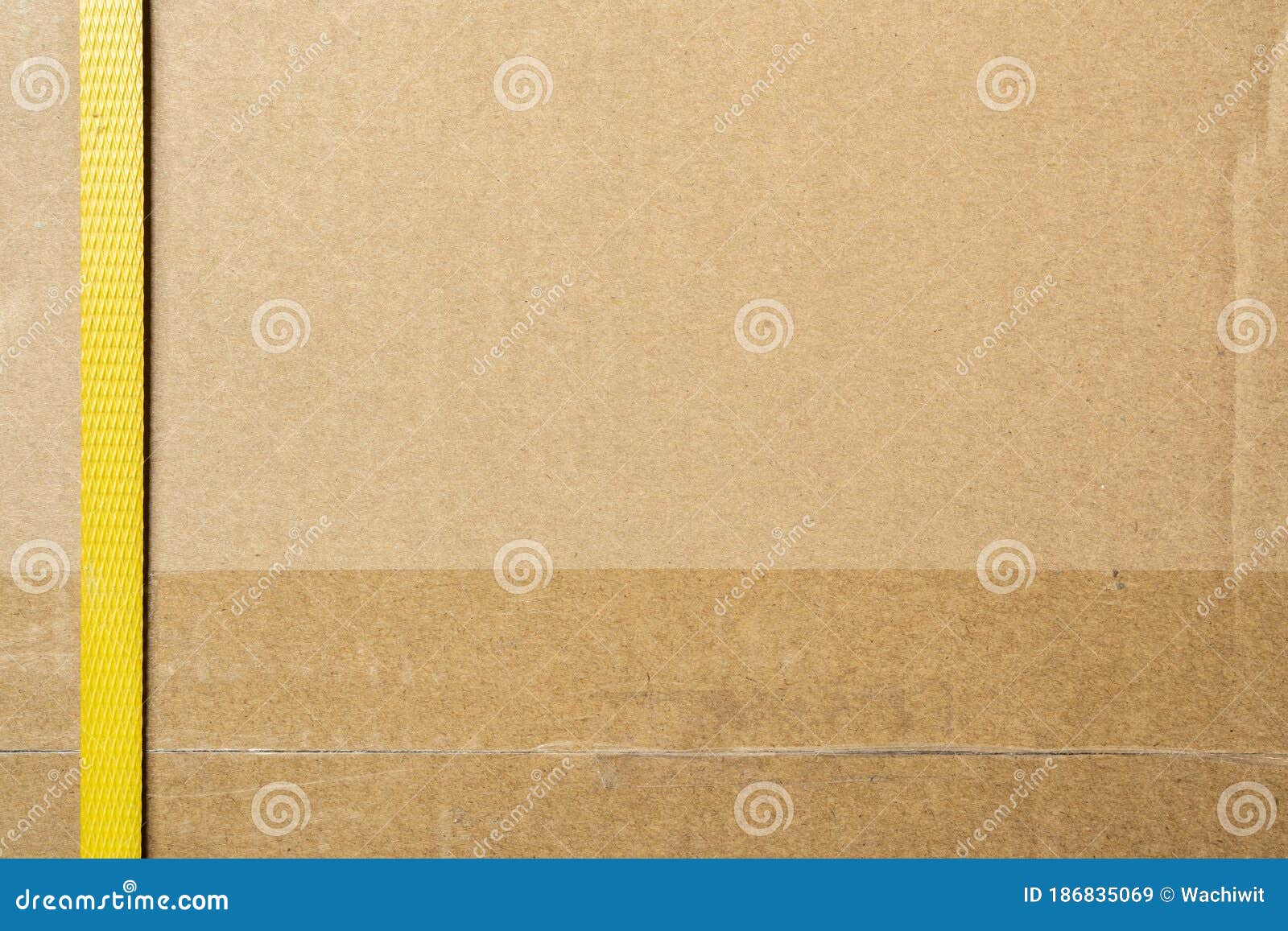 Cardboard Box Closed by Shipping Packaging Tape and Strapping Stock