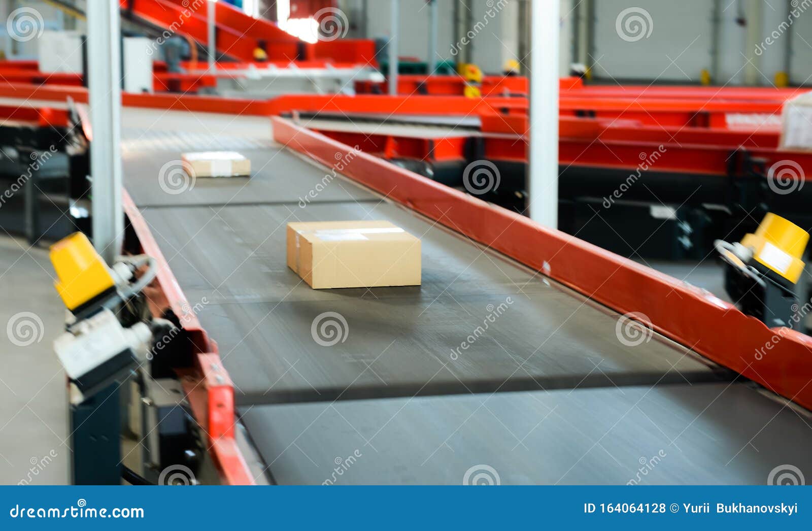 cardboard boxes on conveyor belt.parcels transportation system concept