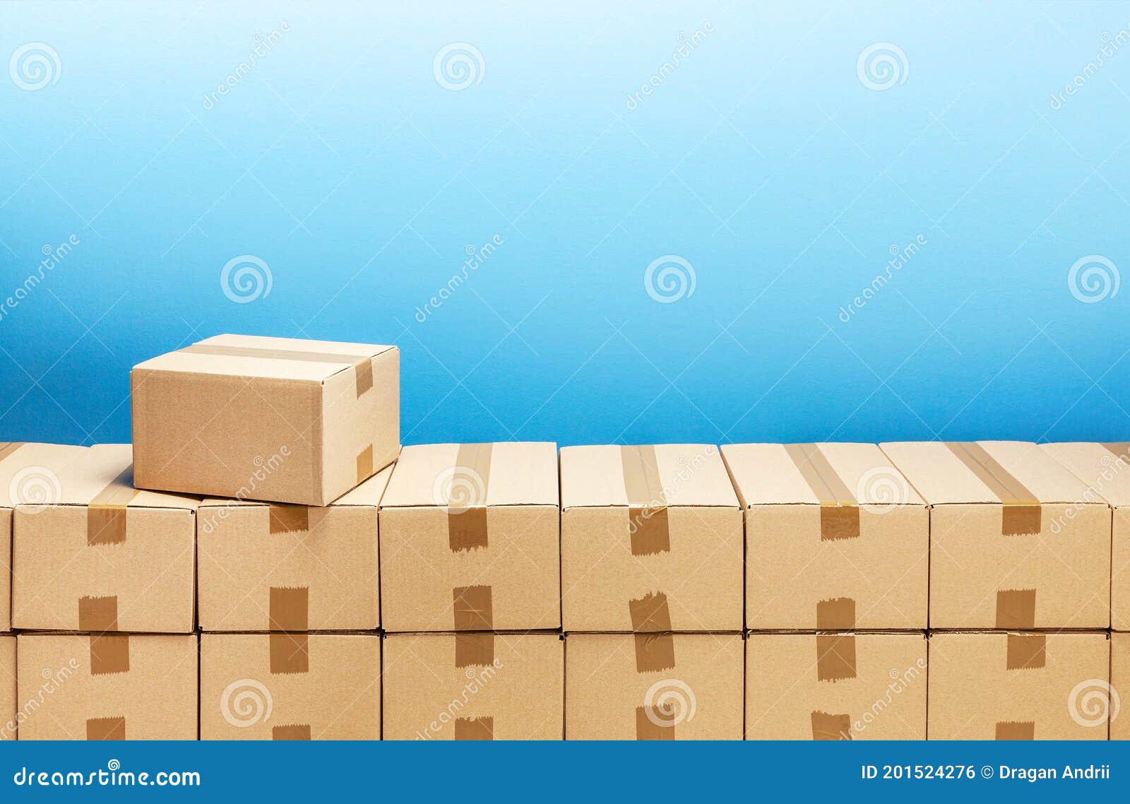 Cardboard Boxes for Delivery or Moving. Stack of Boxes and Blue