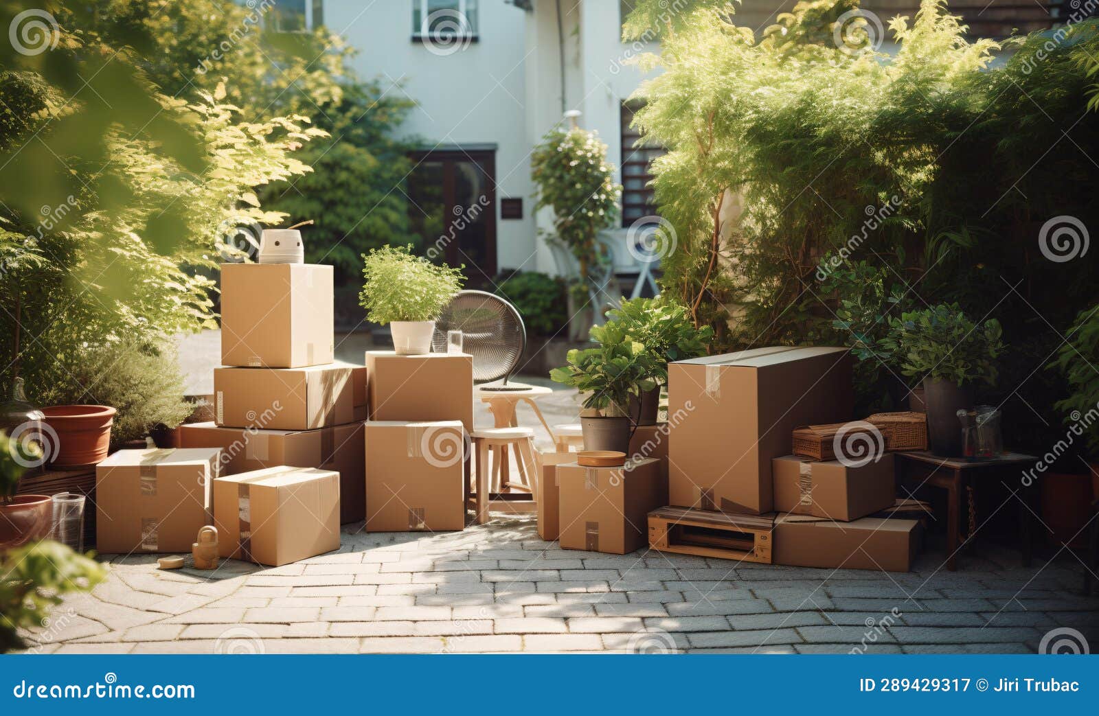 Cardboard Boxes and Household Items Ready for Moving Day. Stock Image
