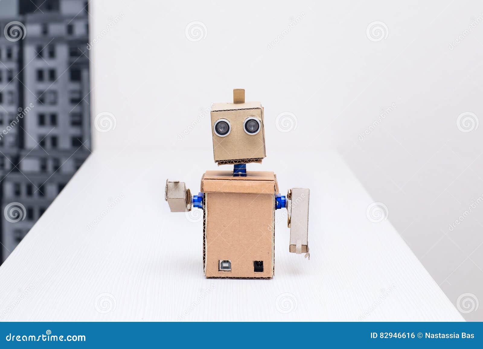 Cardboard Robot Arms on the White Table at Home Stock Photo - Image sample, robot: 82946616