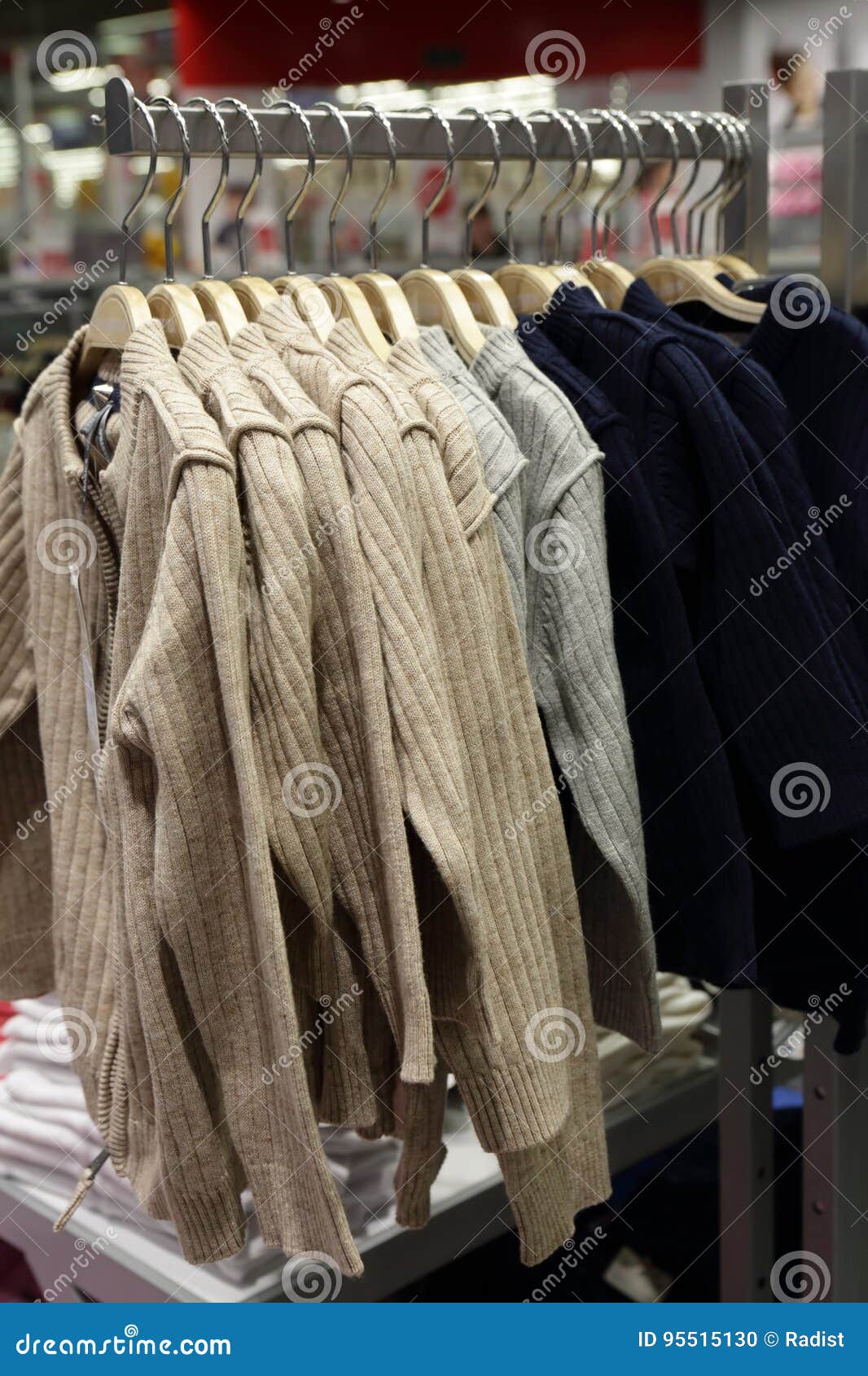 Cardigans on hangers stock photo. Image of indoor, business 95515130