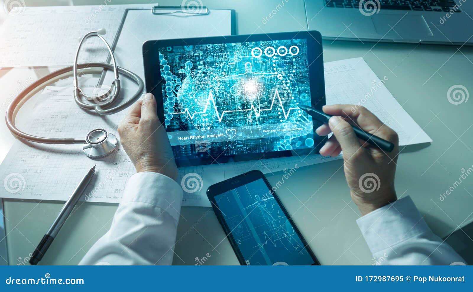 cardiologist doctor analysis and checking data patient and  electronic medical record in tablet on digital modern virtual screen