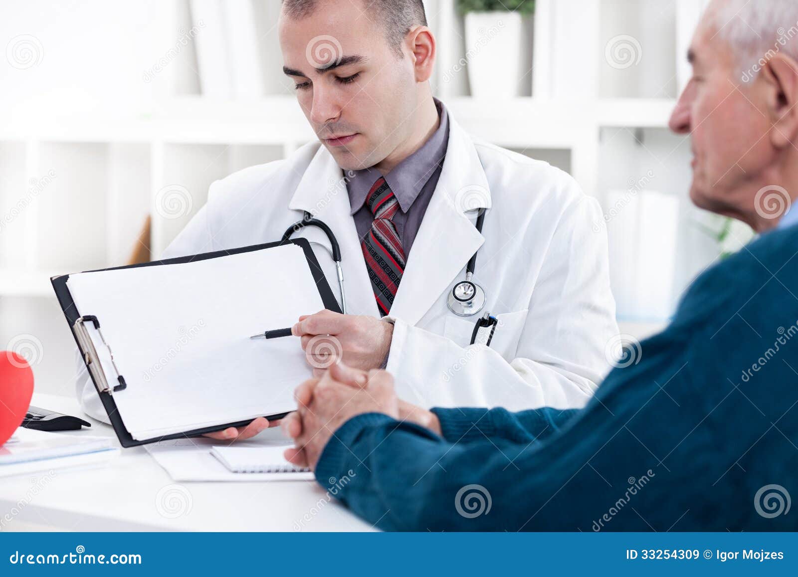 cardiologist showing ekg results