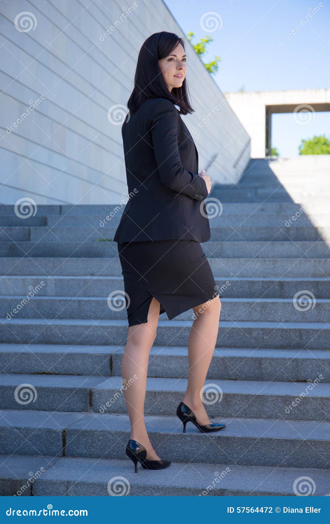 Career Concept - Beautiful Woman In Business Suit Standing On St Stock ...