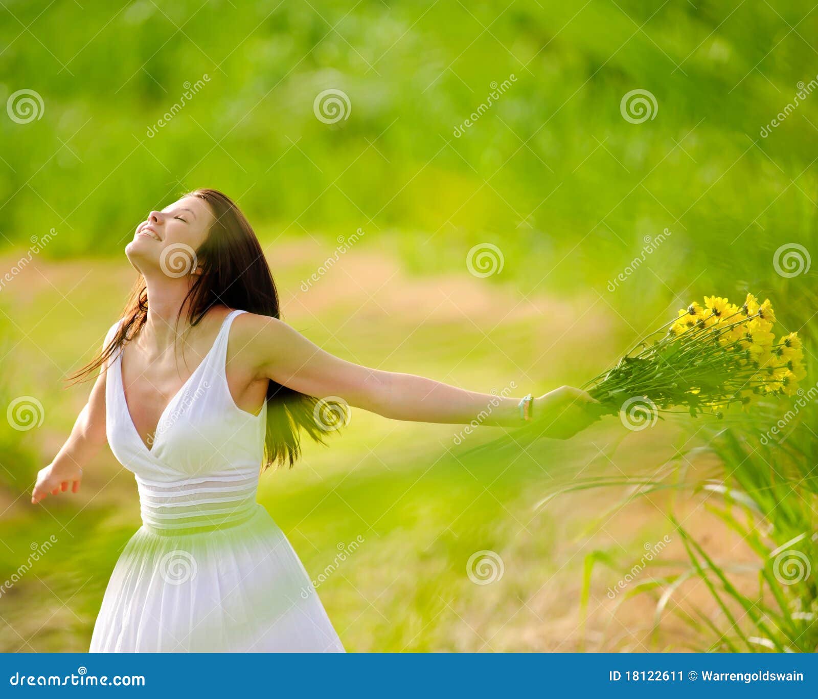 carefree attractive girl in field