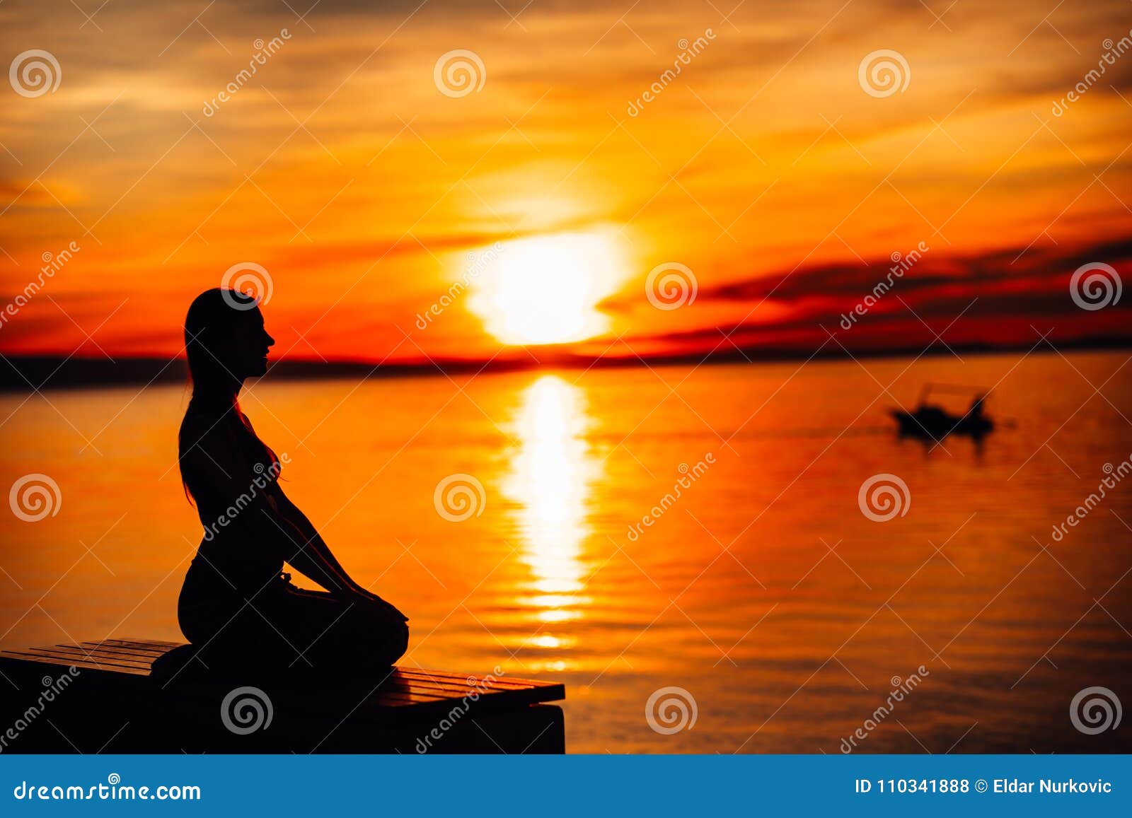 carefree calm woman meditating in nature.finding inner peace.yoga practice.spiritual healing lifestyle.enjoying peace,anti-stress