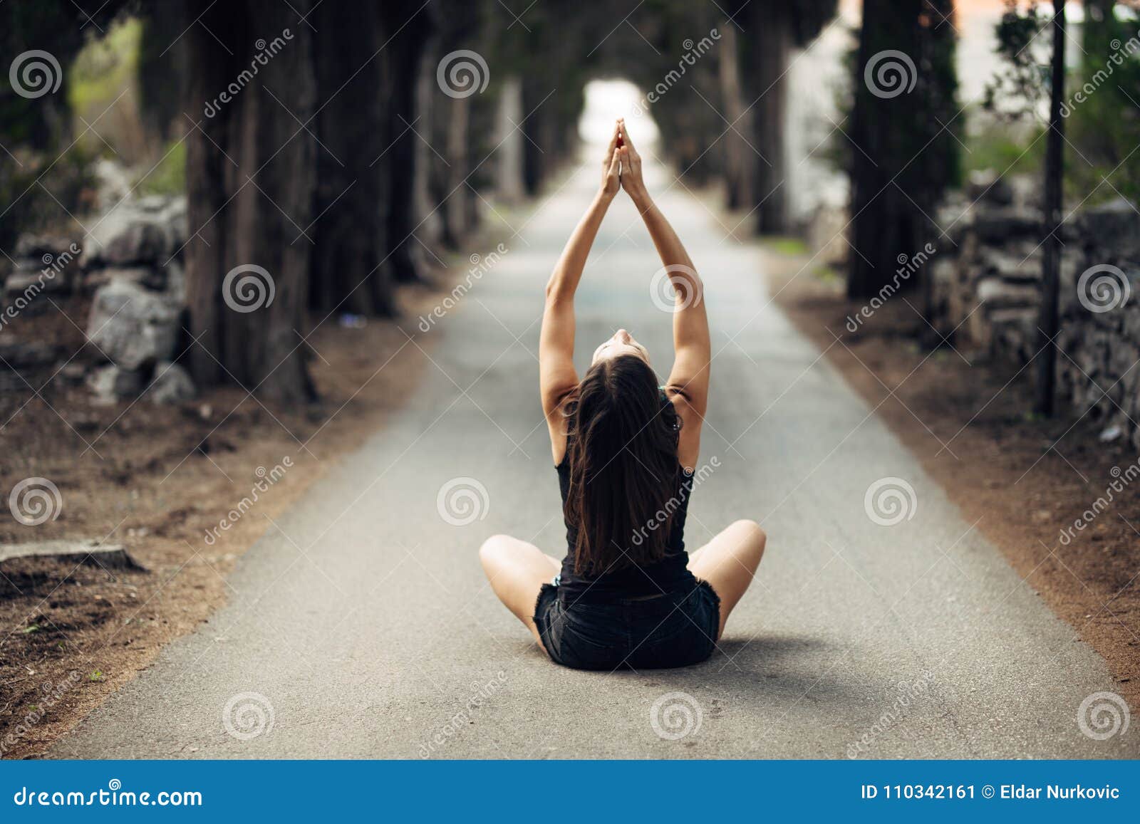 carefree calm woman meditating in nature.finding inner peace.yoga practice.spiritual healing lifestyle.enjoying peace,anti-stress