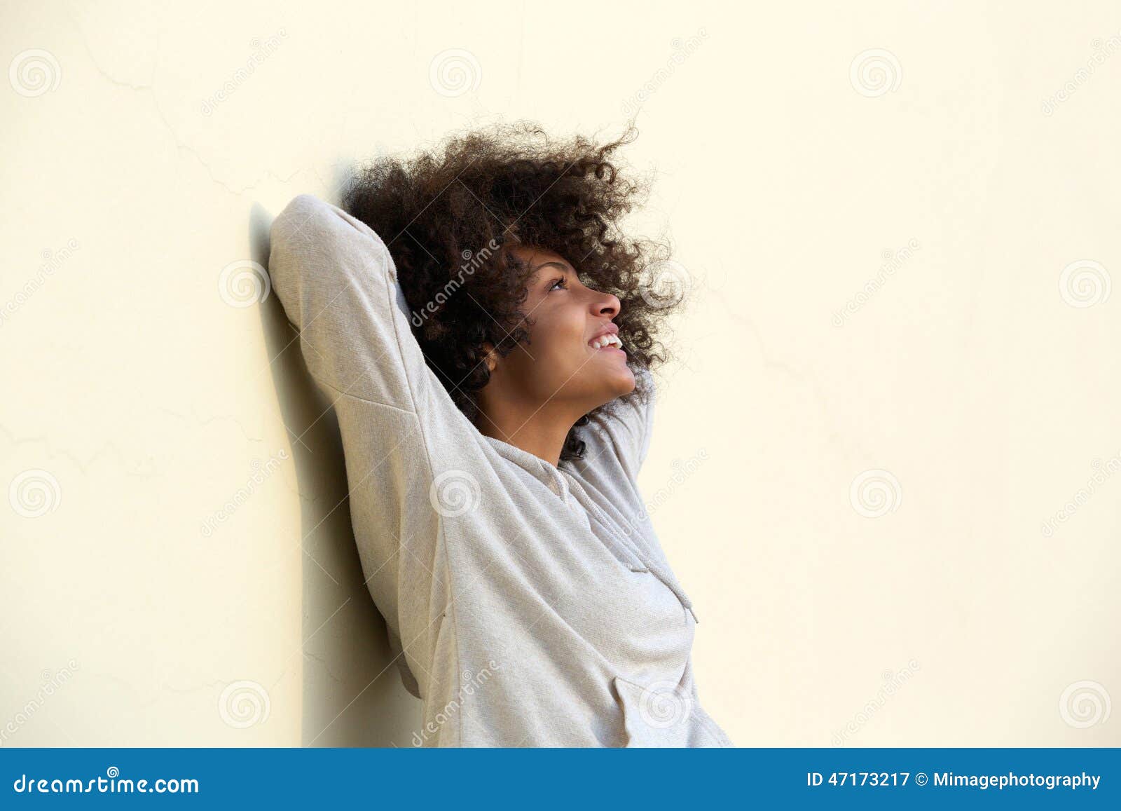 carefree young african american woman smiling