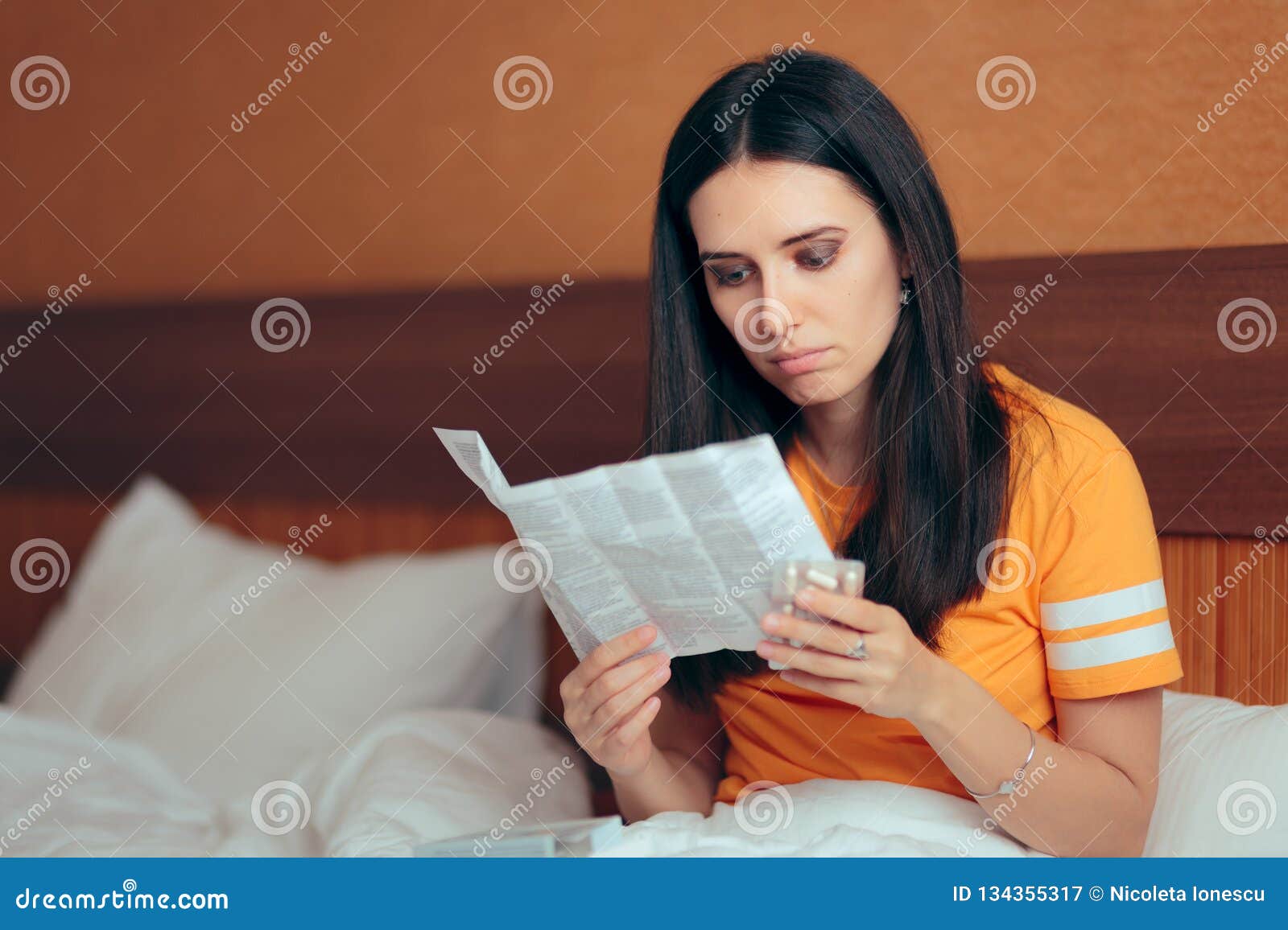 Woman Reading Medicine Leaflet Before Taking Pills Stock Image Image