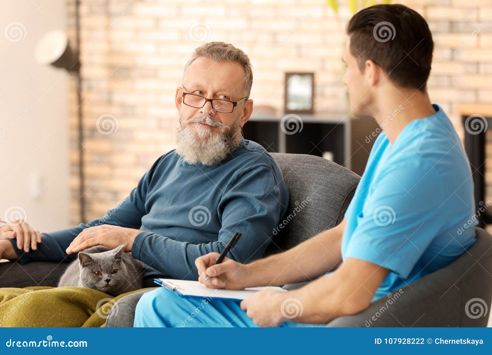 Caregiver with senior man stock photo. Image of home 107928222