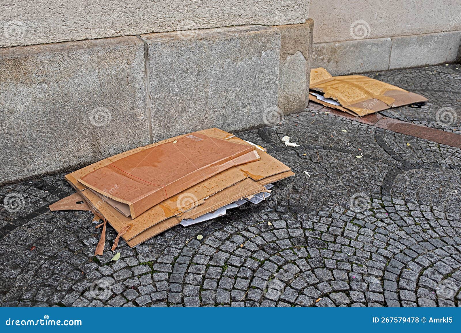 carelessly disposed garbage cardboard in the city