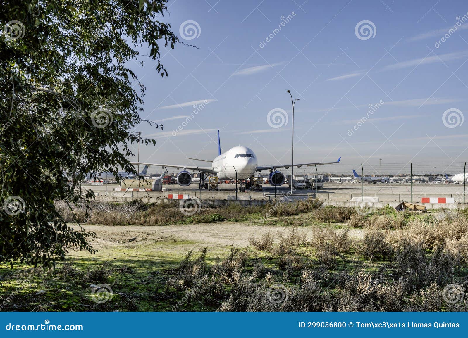 Cargo Planes Receiving Fuel and Refueling on the Runway Stock Photo