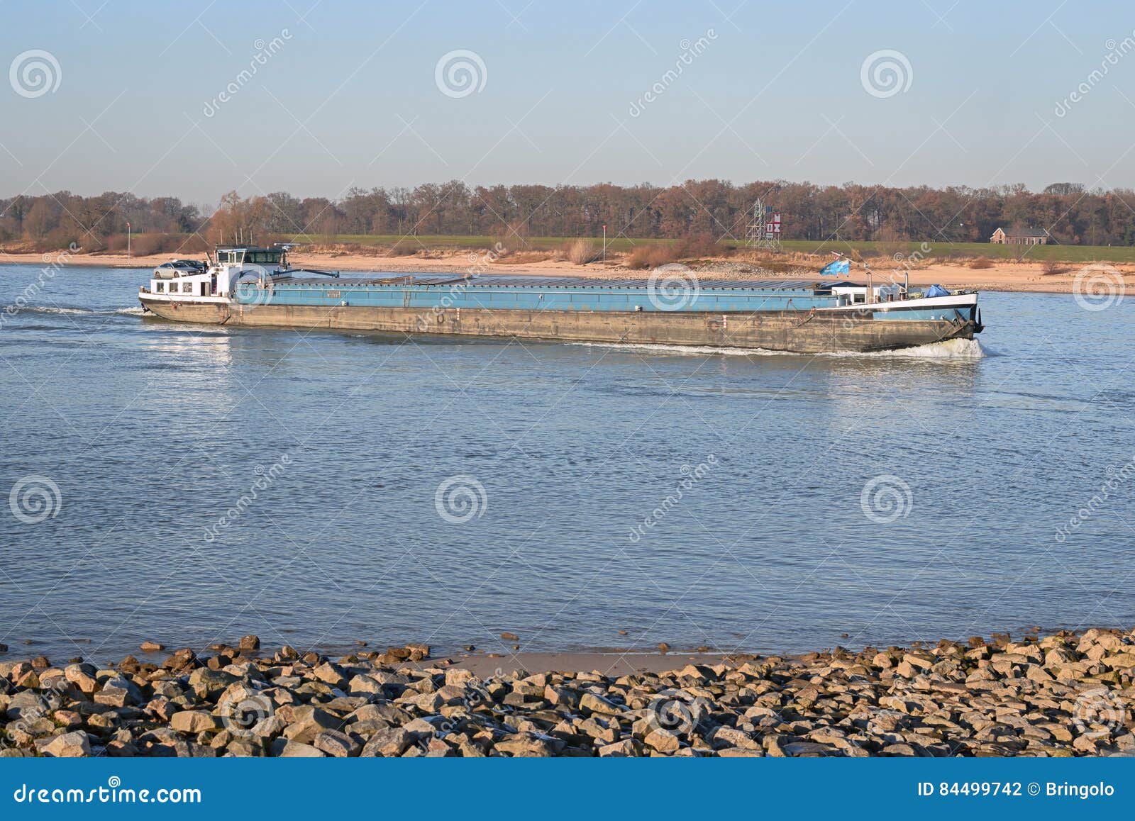 cargo transport by ship at dutch river the waal