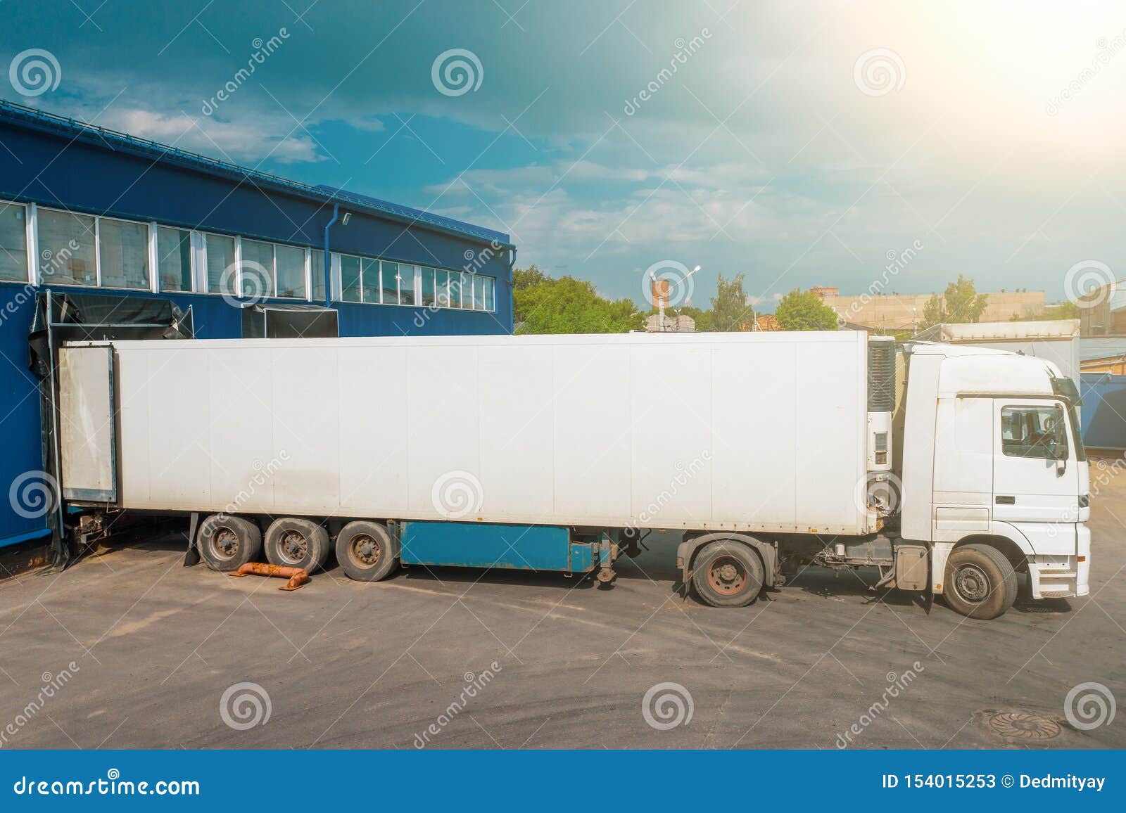 Cargo Truck In Industrial Warehouse Or Logistic Center Waiting For Loading Goods Stock Image Image Of Construction Container 154015253