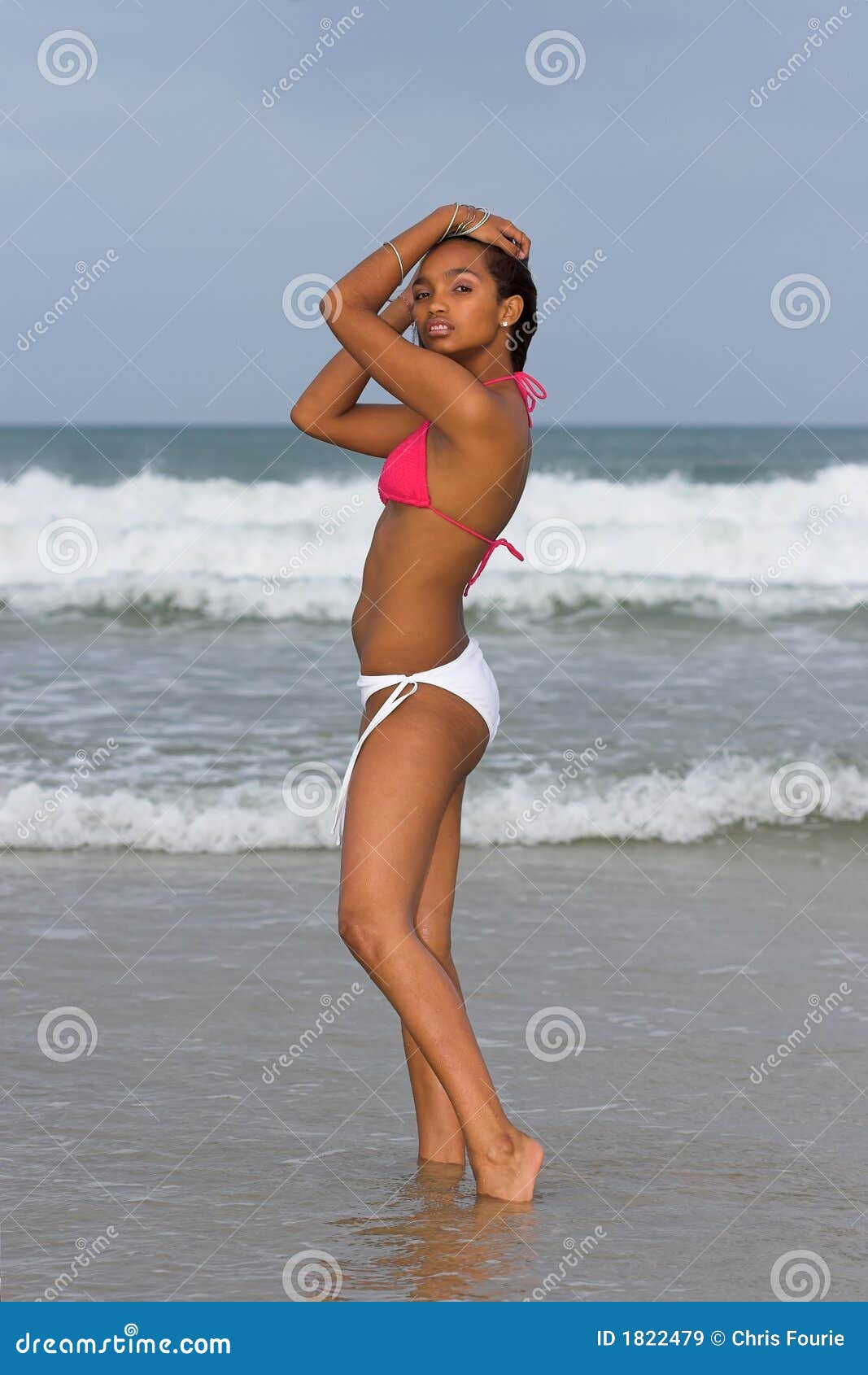 Teenage girl wearing white bikini hi-res stock photography and