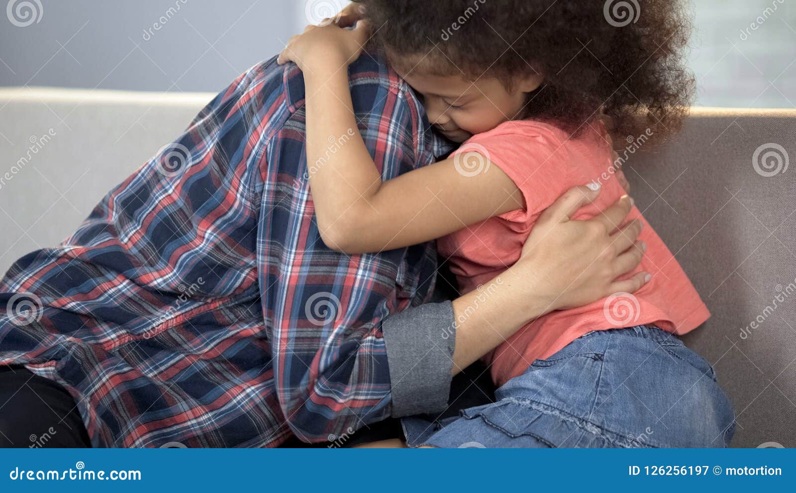 caring adult lady hugging little girl, child adoption system, family happiness