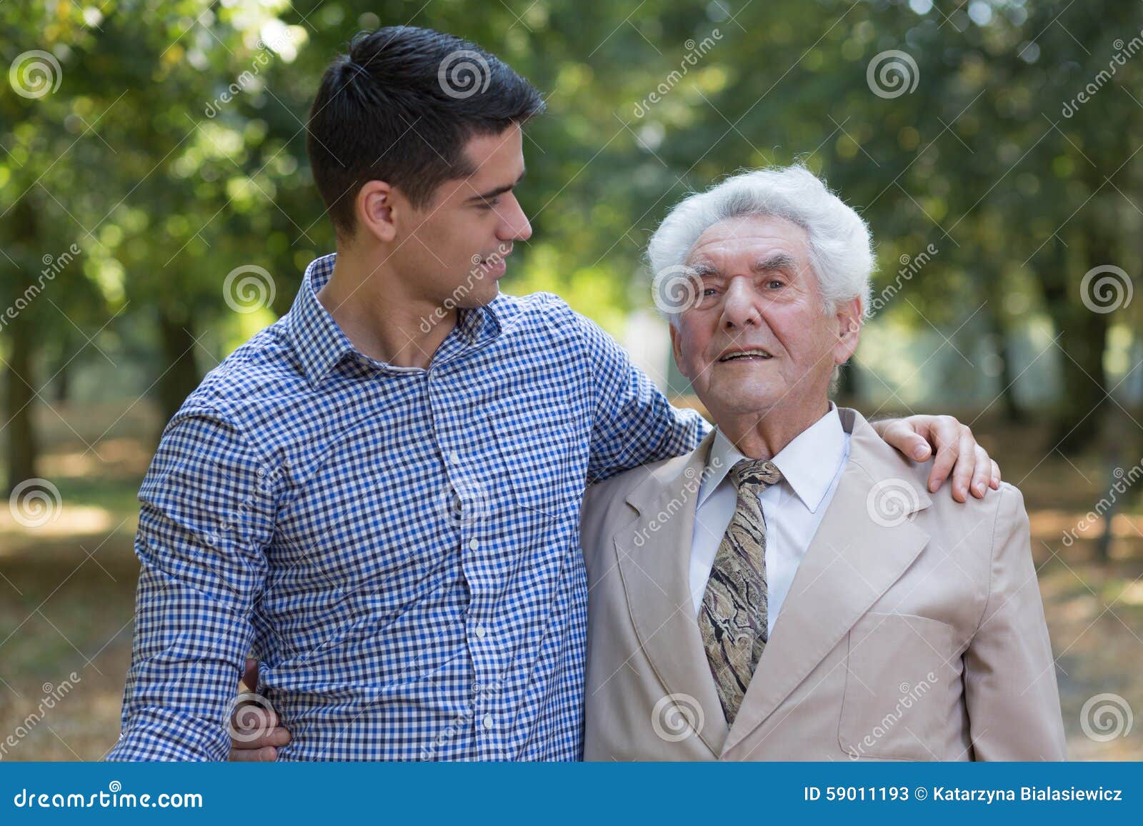 caring grandson and his grandfather