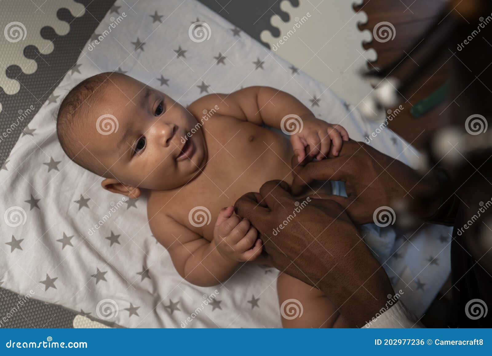 newborn boy diaper change