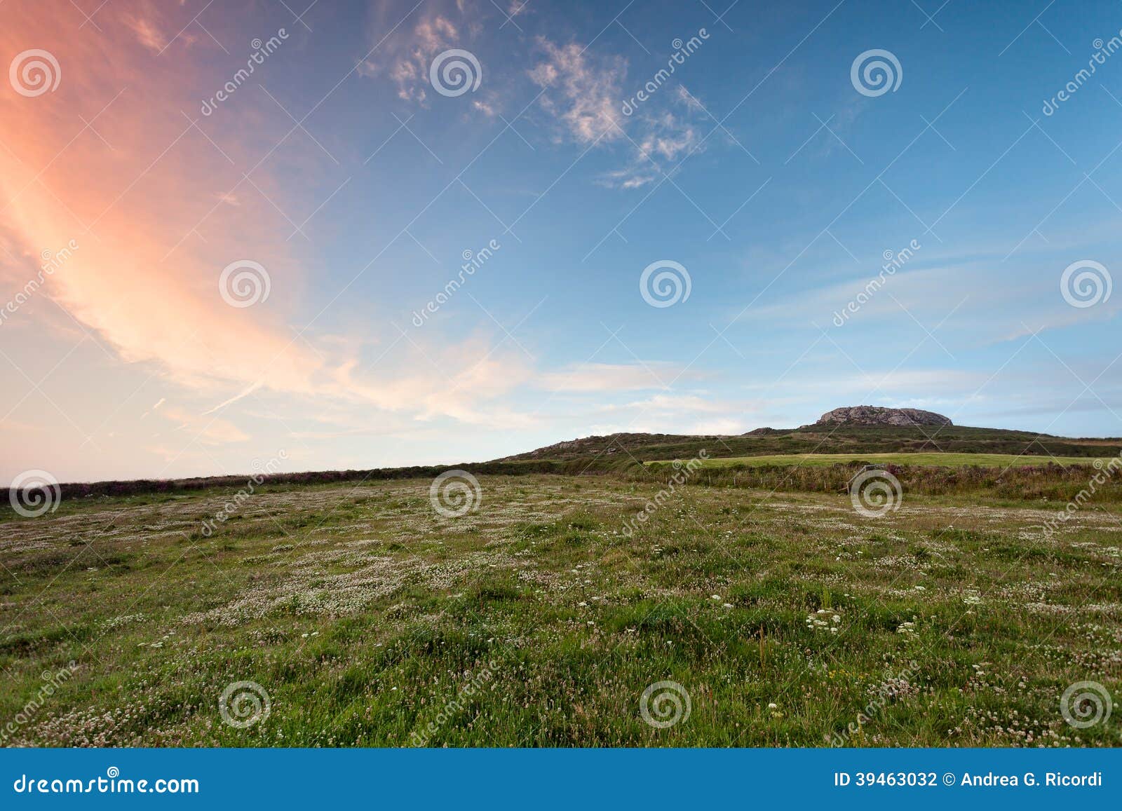 carn llidi, pembrokeshire green hill at sunset
