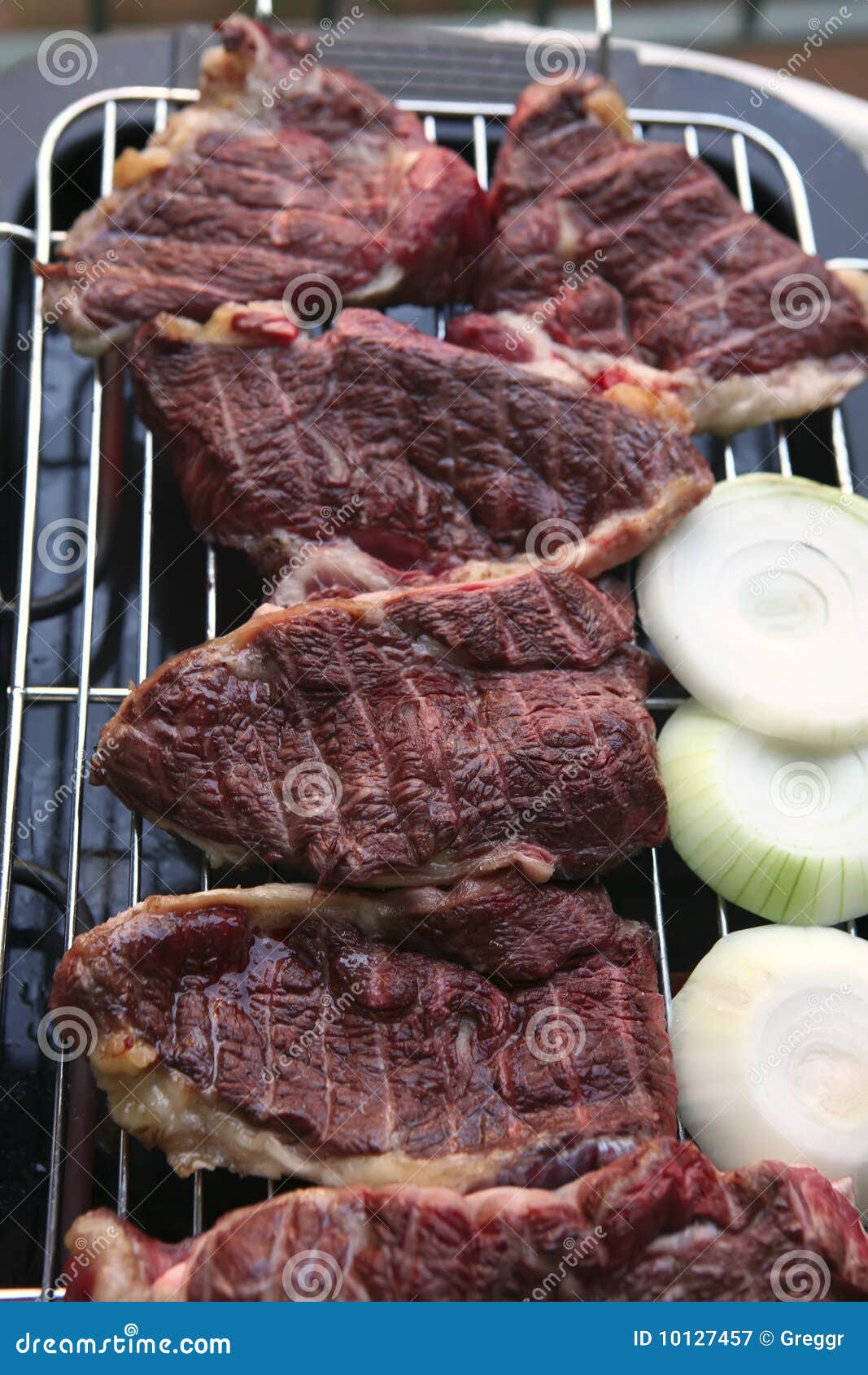 Carne De La Carne Asada En El Asador Eléctrico Imagen de archivo - Imagen  de rejilla, cocina: 10127457