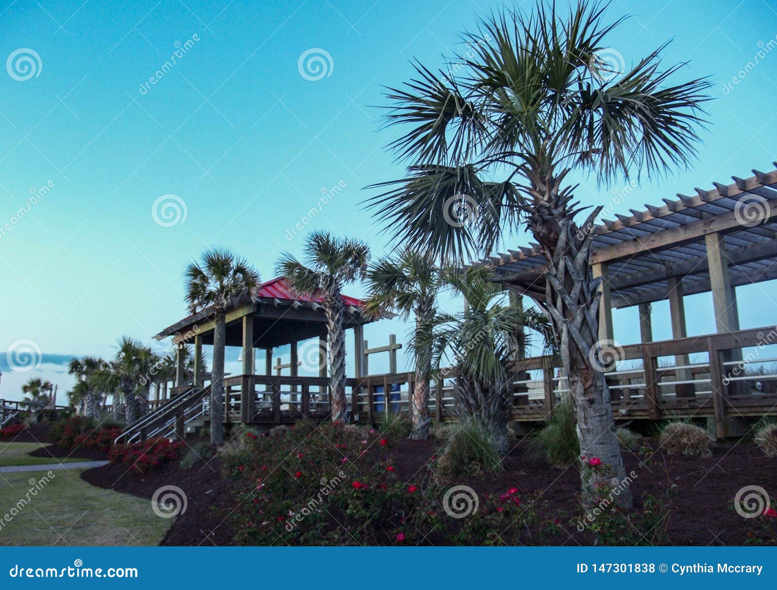 carolina beach boardwalk at sunset