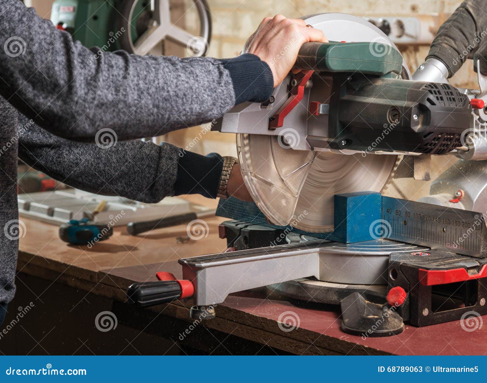 Carpenter cutting wood stock image. Image of occupation 68789063