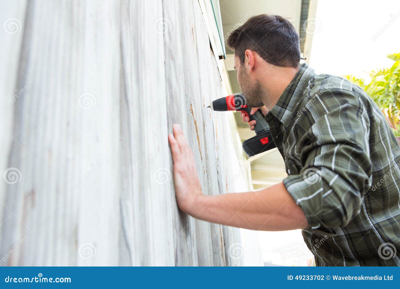 Carpenter Drilling Wooden Cabin Stock Photo Image of standing