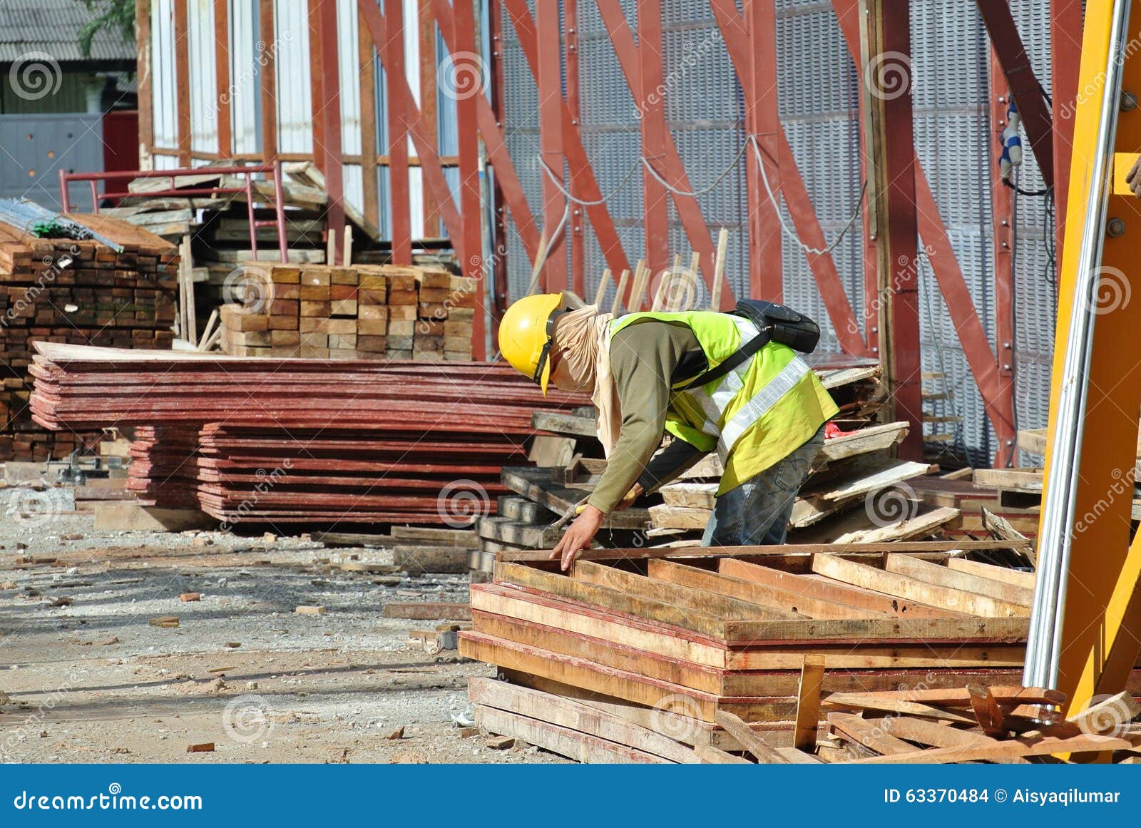 Carpenter Fabricating Timber Form Work At The Construction 