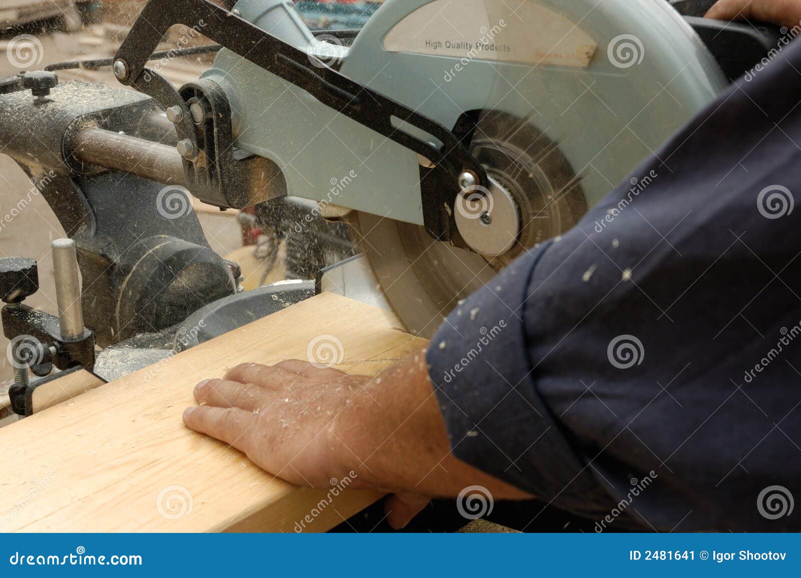 Carpenter hand and saw stock image. Image of electric 2481641