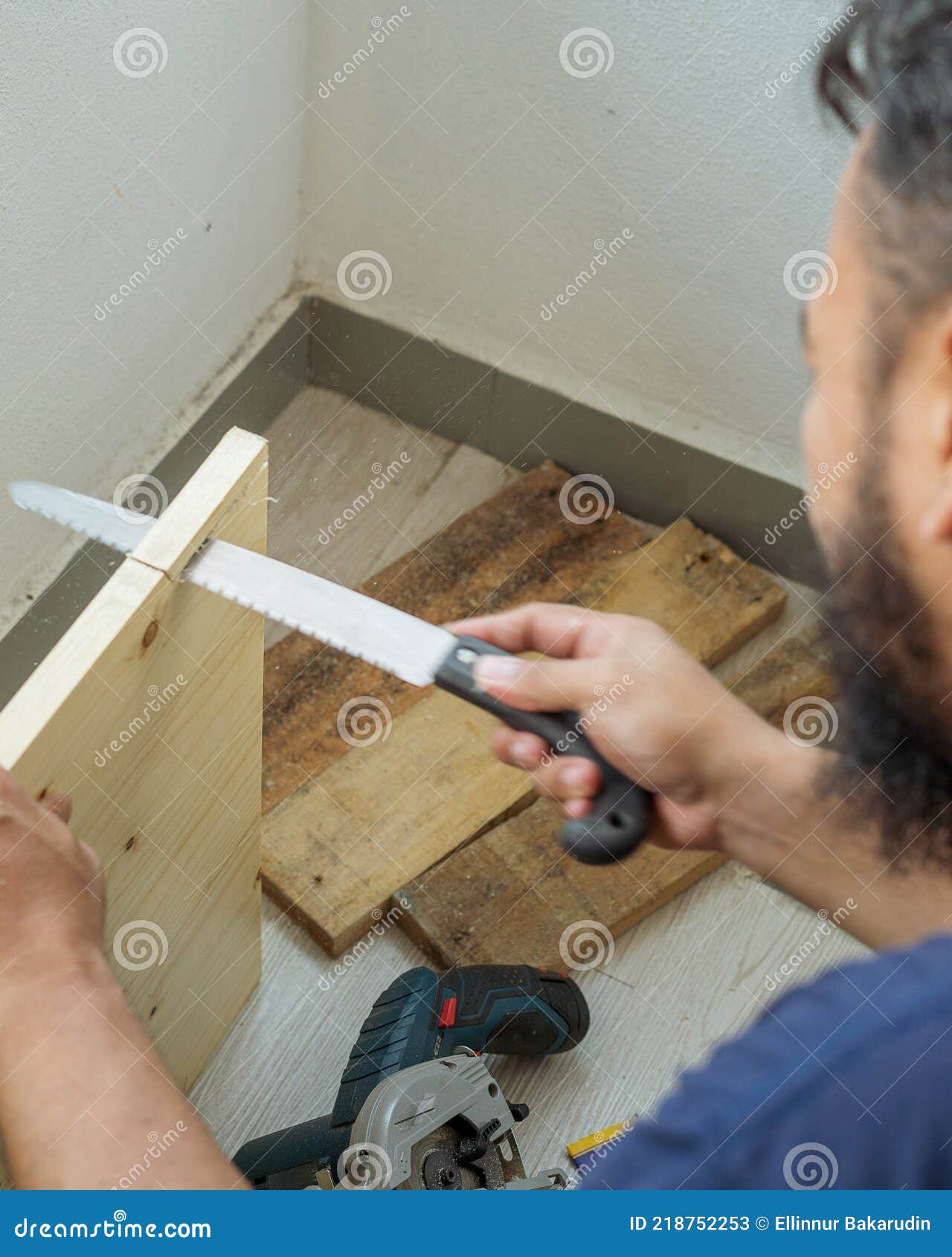 Carpenter Hand with Saw Cutting Wooden Boards Stock Image Image of