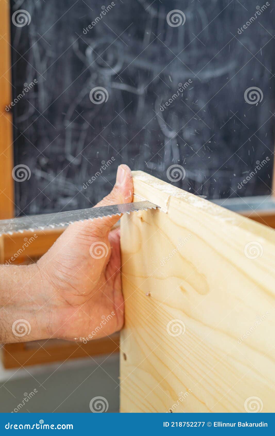 Carpenter Hand with Saw Cutting Wooden Boards Stock Image Image of