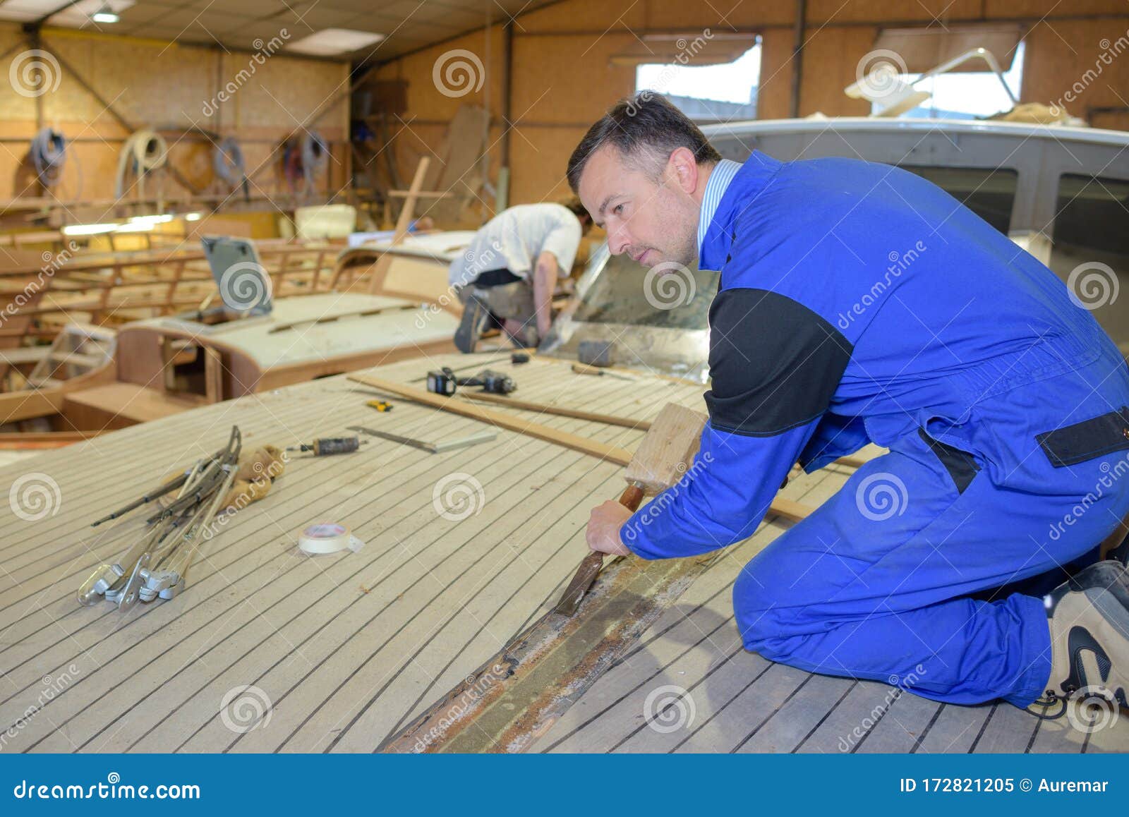 Carpenter Making Boat Using Chisel and Hammer Stock Image Image of