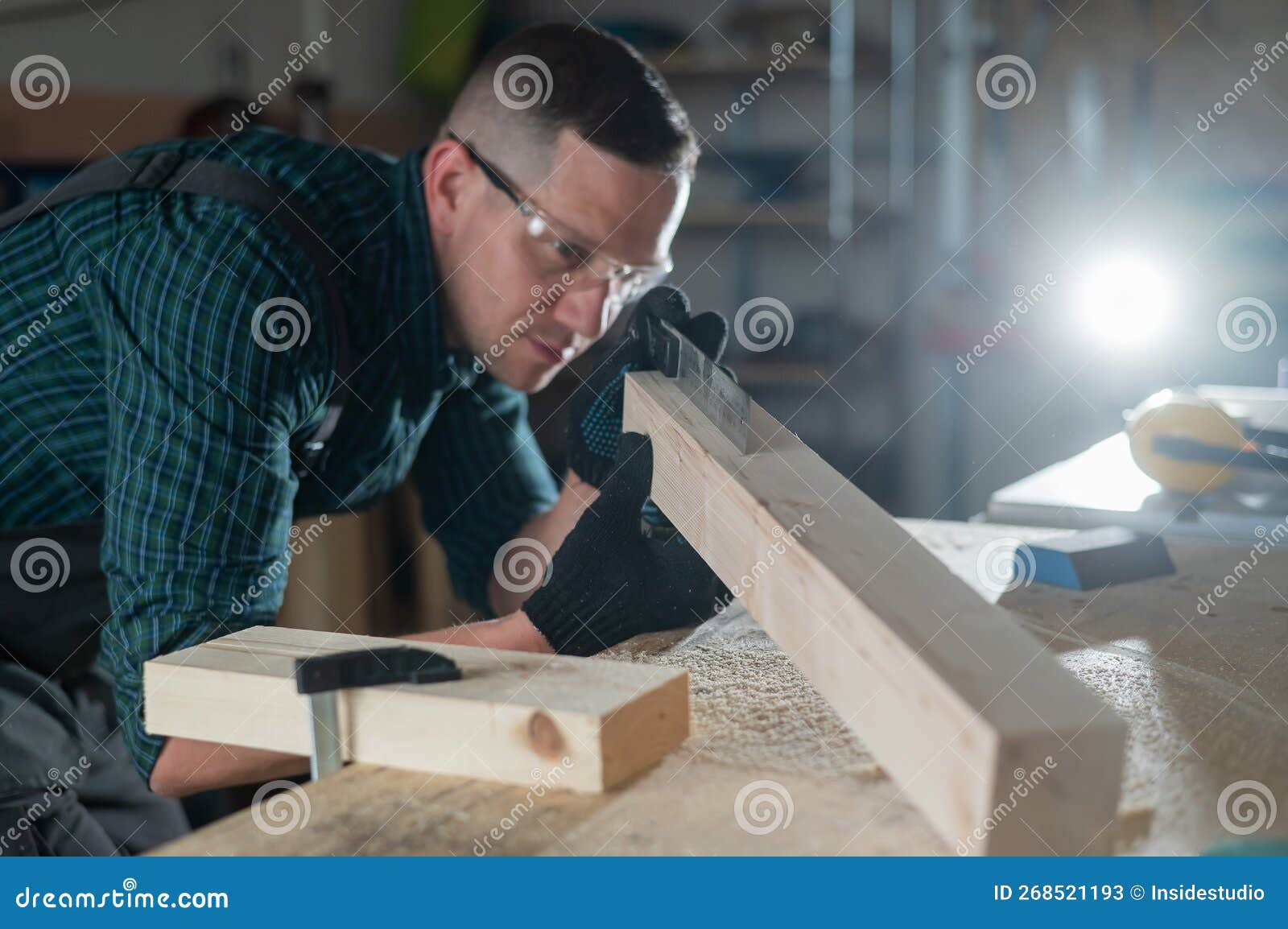 Carpenter Measures The Distance Using A Measure And Marks With A