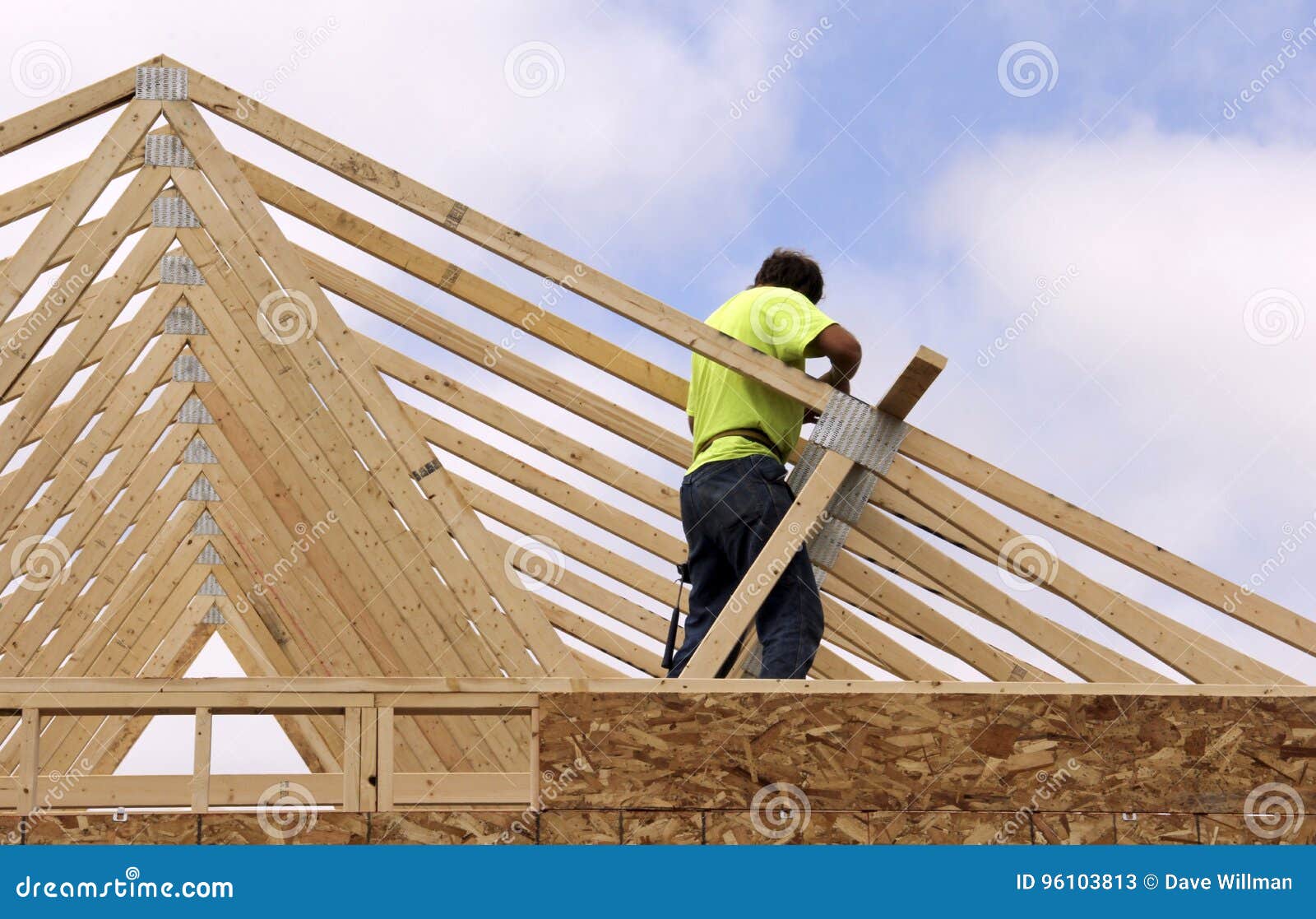Carpenter Setting Trusses for the Roof of a House Stock Image Image