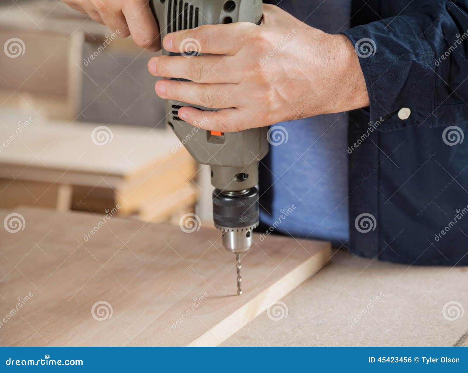 Carpenter Using Drill on Wood in Stock Photo Image of adult